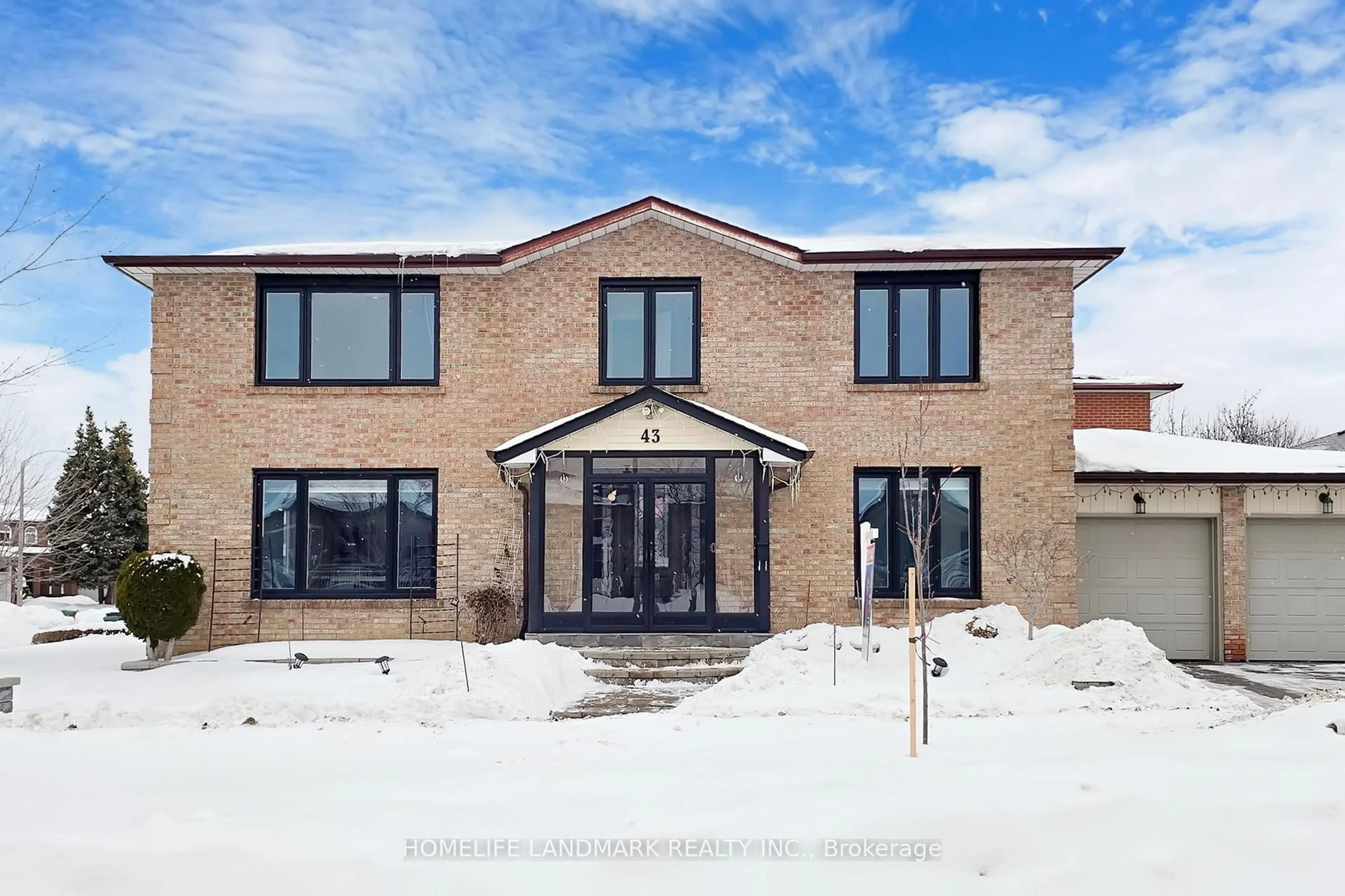 Home with brick exterior material, building for 43 Triangle Villas Dr, Toronto Ontario M1W 3L1