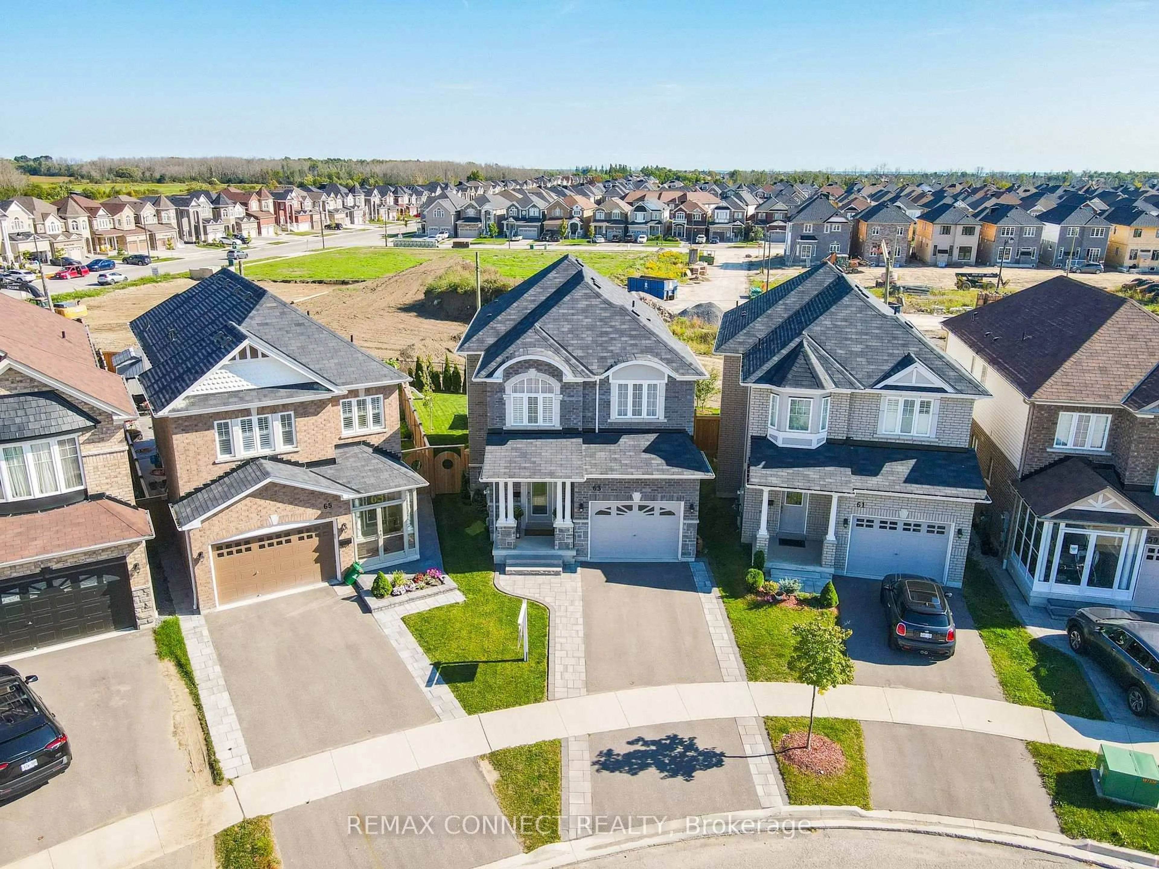 A pic from outside/outdoor area/front of a property/back of a property/a pic from drone, street for 63 Jevons Dr, Ajax Ontario L1Z 0T6
