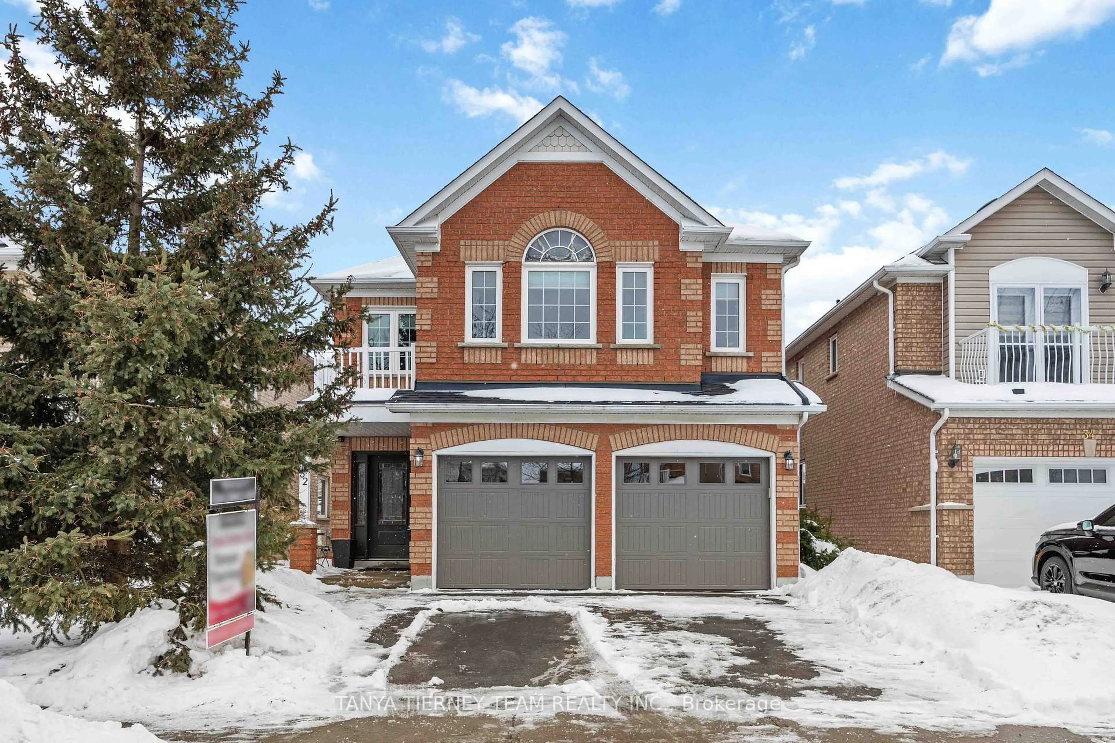 Home with brick exterior material, street for 32 Four Winds Dr, Whitby Ontario L1N 9R8