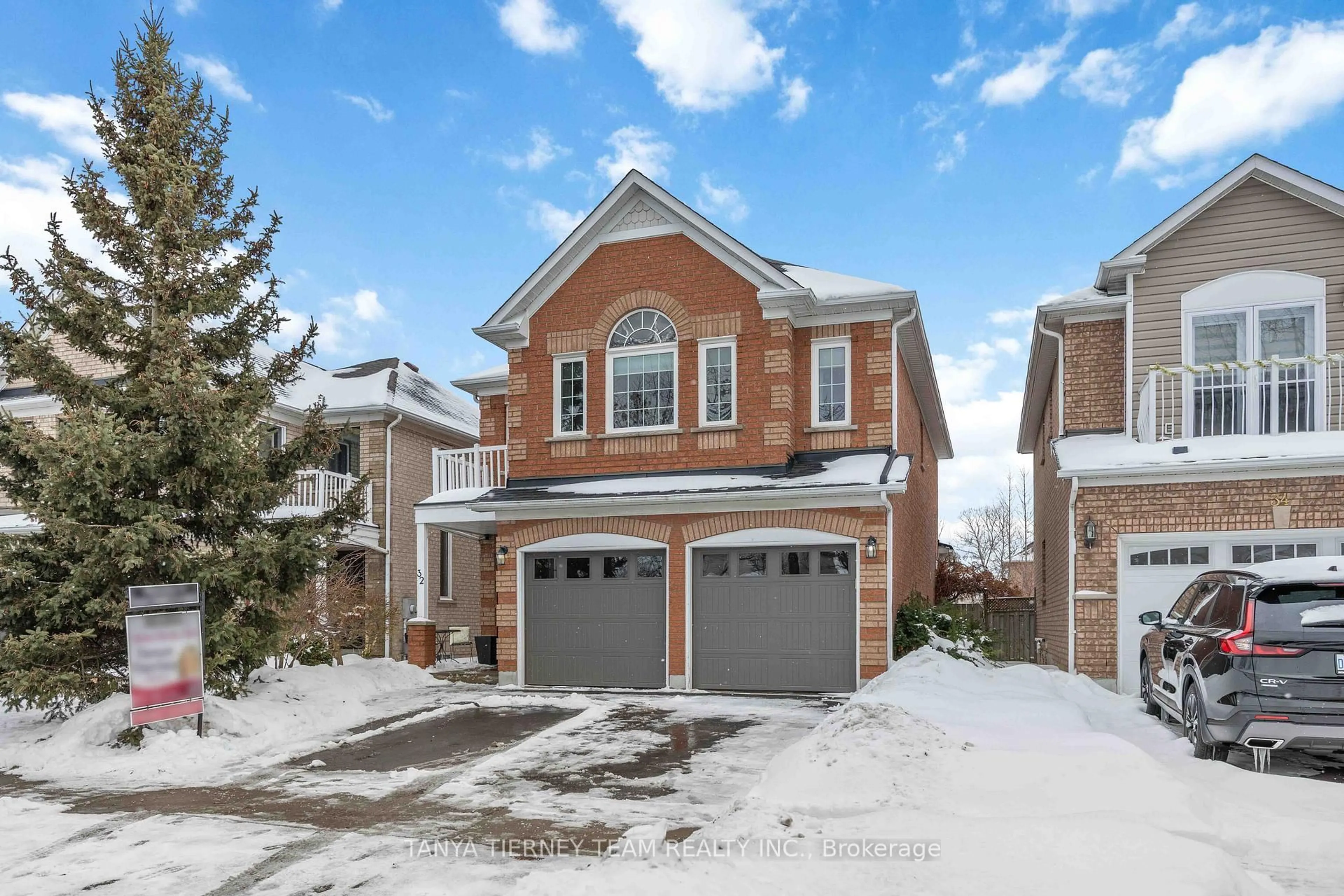 Home with brick exterior material, street for 32 Four Winds Dr, Whitby Ontario L1N 9R8