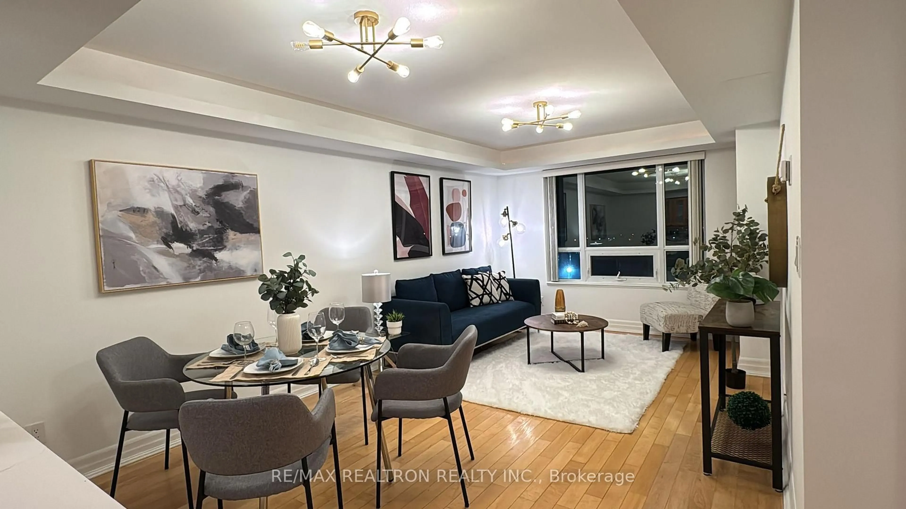 Living room with furniture, unknown for 2020 McNicoll Ave #611, Toronto Ontario M1V 0B5
