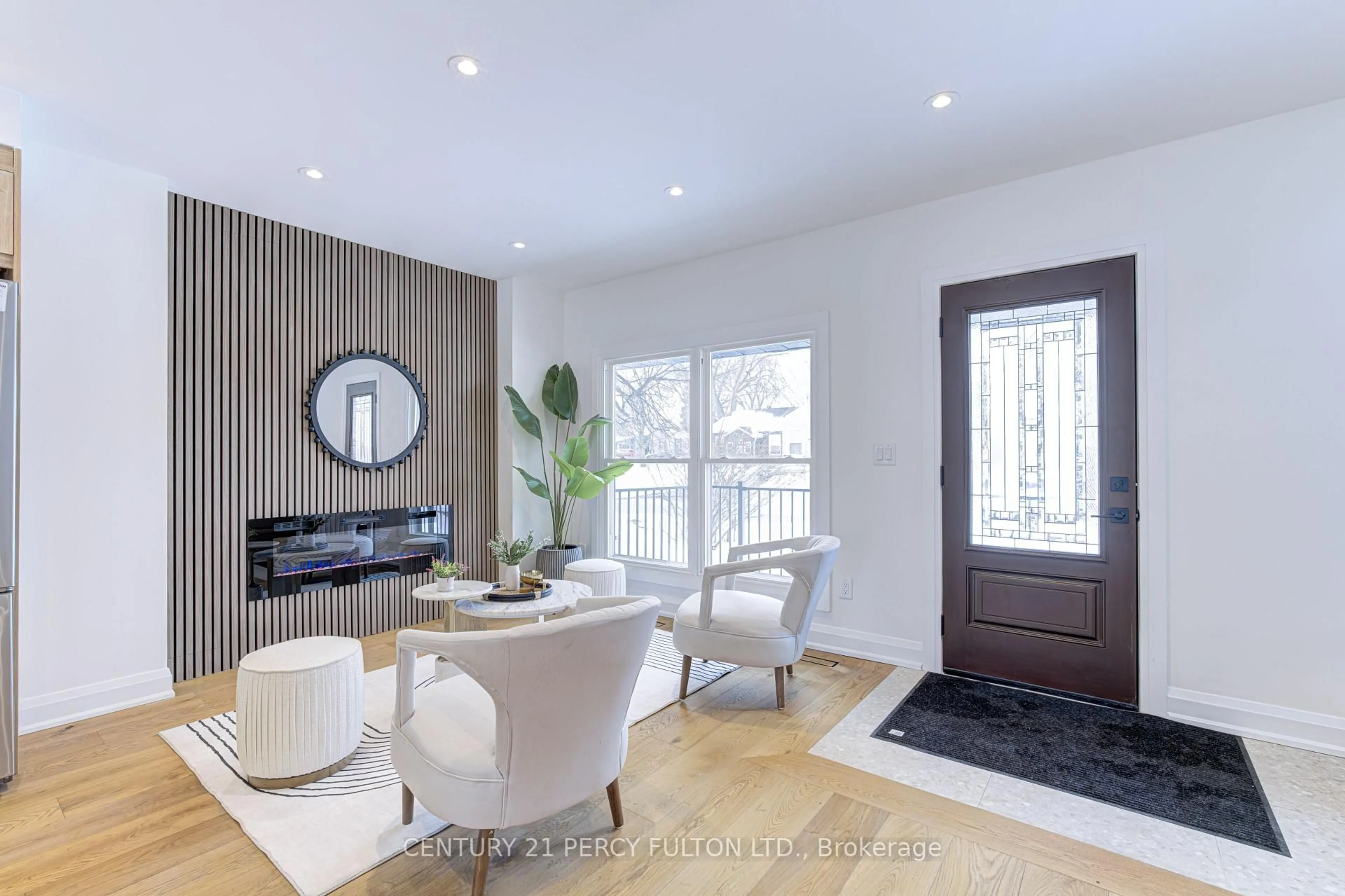 Living room with furniture, wood/laminate floor for 21 Nelson Ave, Ajax Ontario L1S 1Z6