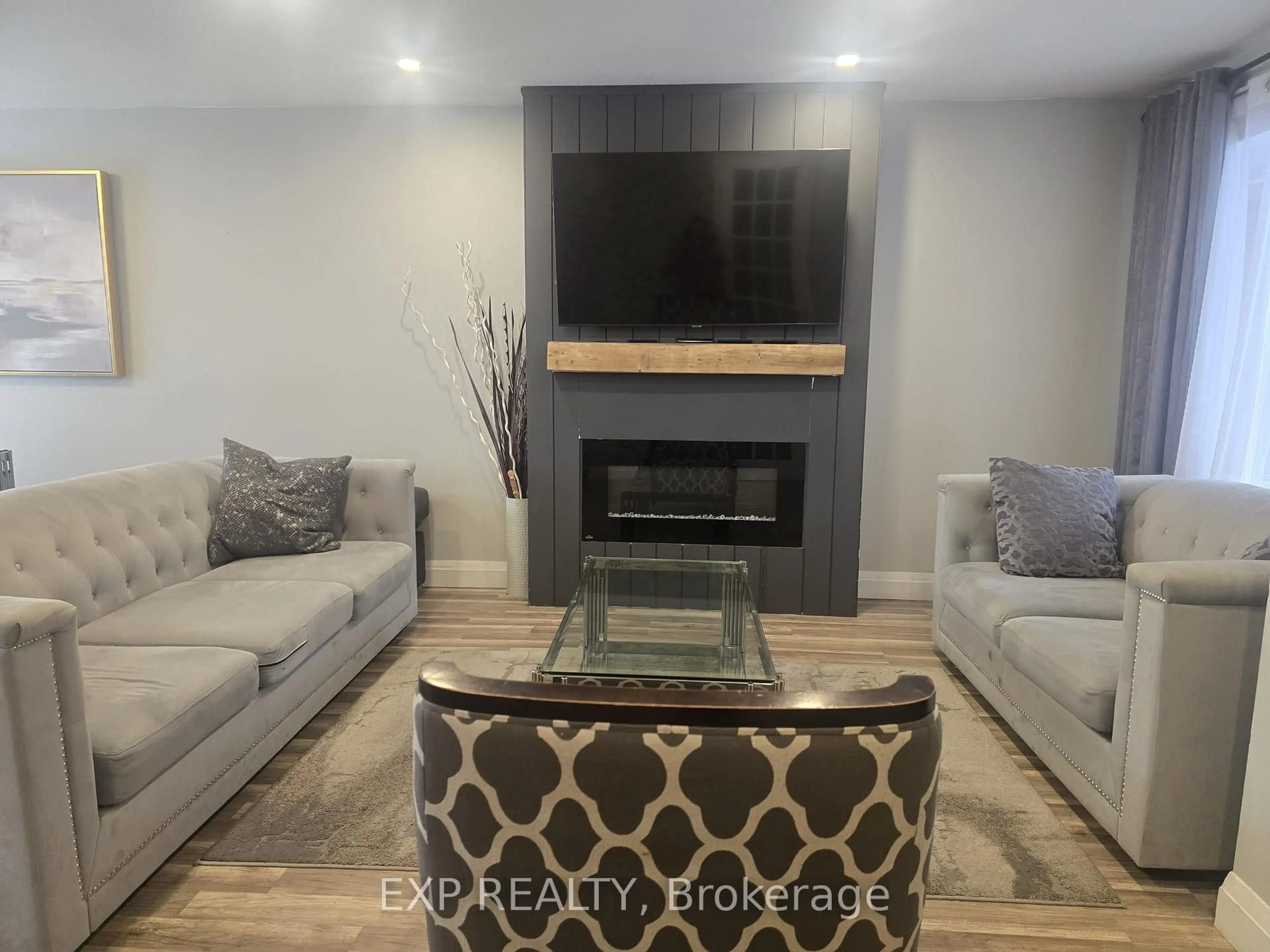 Living room with furniture, unknown for 700 Harmony Rd #44, Oshawa Ontario L1K 1S2