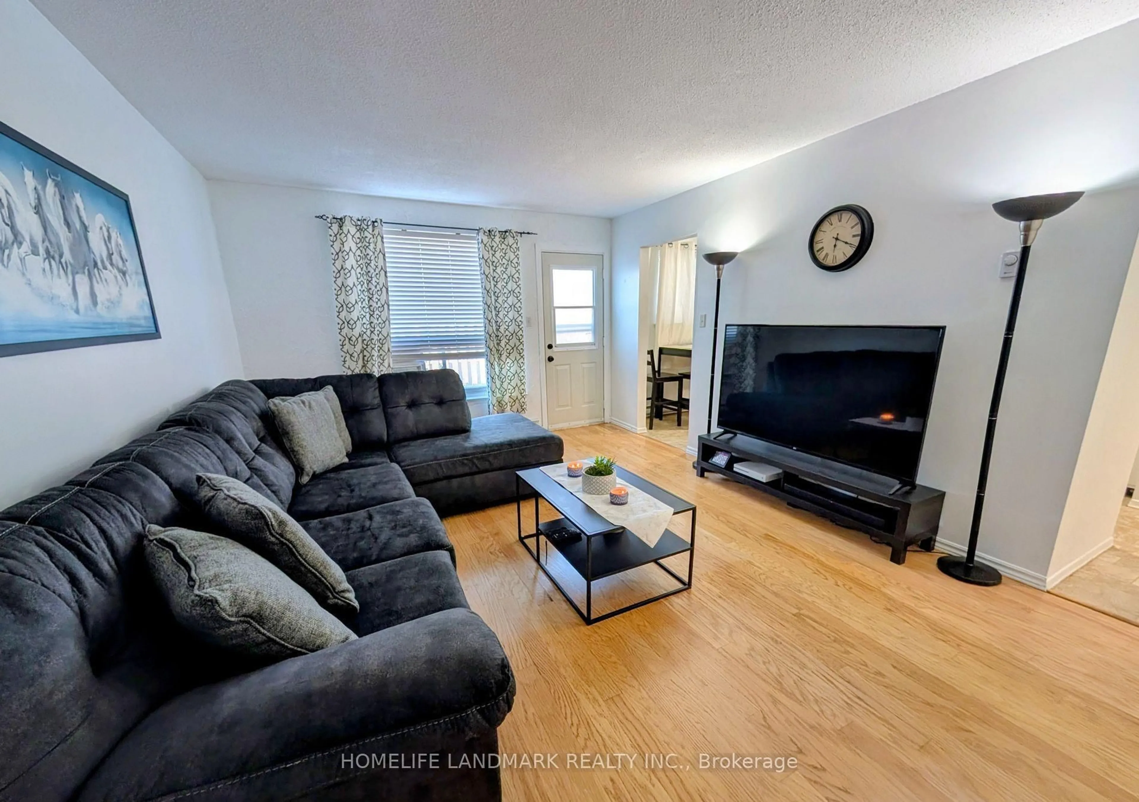 Living room with furniture, unknown for 120 Nonquon Rd #15, Oshawa Ontario L1G 7E6