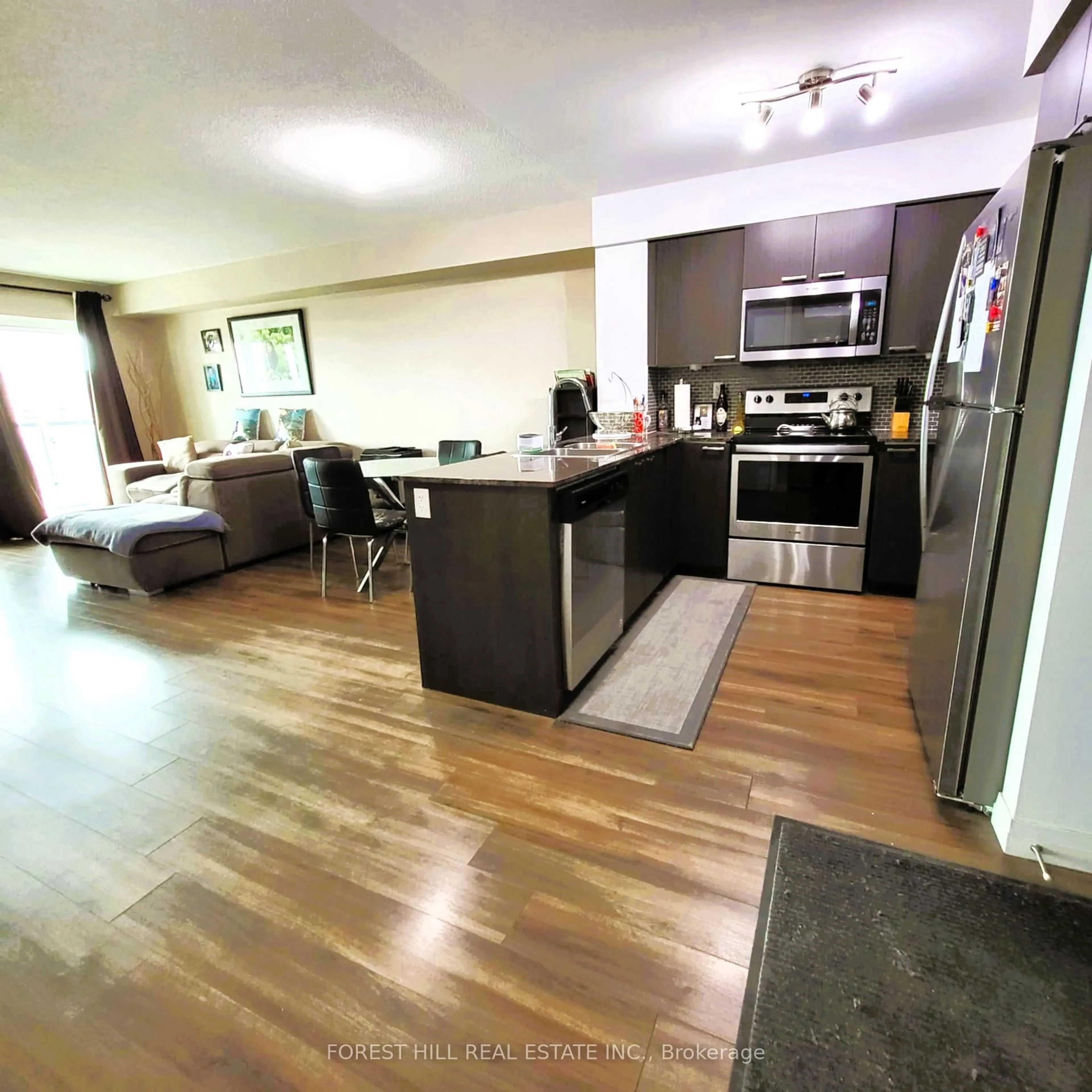 Open concept kitchen, unknown for 2150 Lawrence Ave #701, Toronto Ontario M1R 3A7