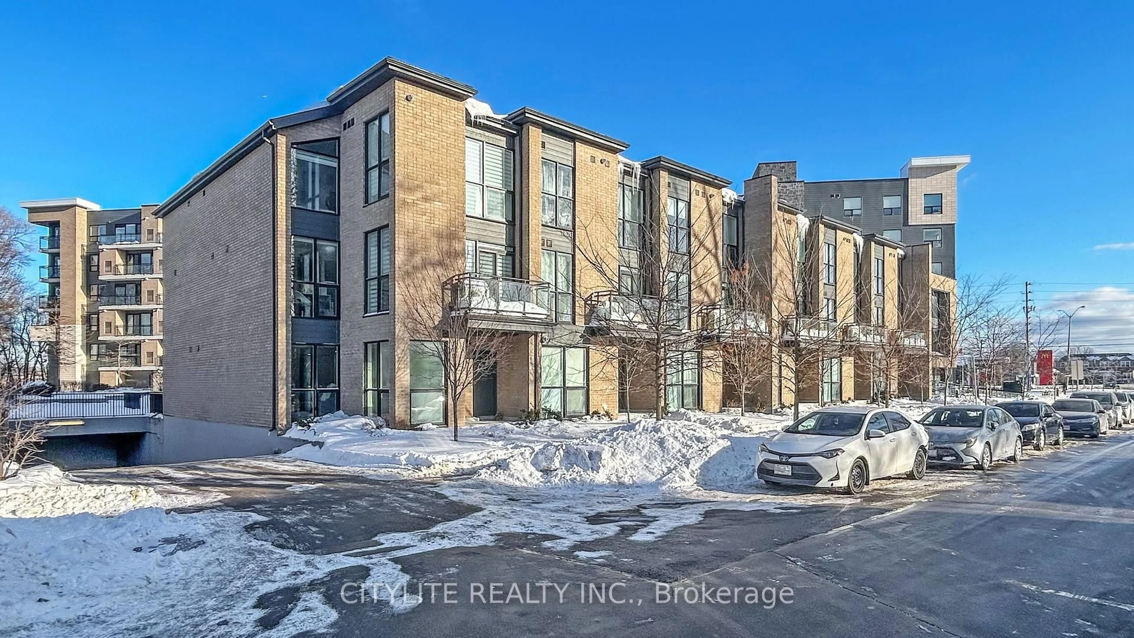 A pic from outside/outdoor area/front of a property/back of a property/a pic from drone, street for 1 Falaise Rd #313, Toronto Ontario M1E 0B9