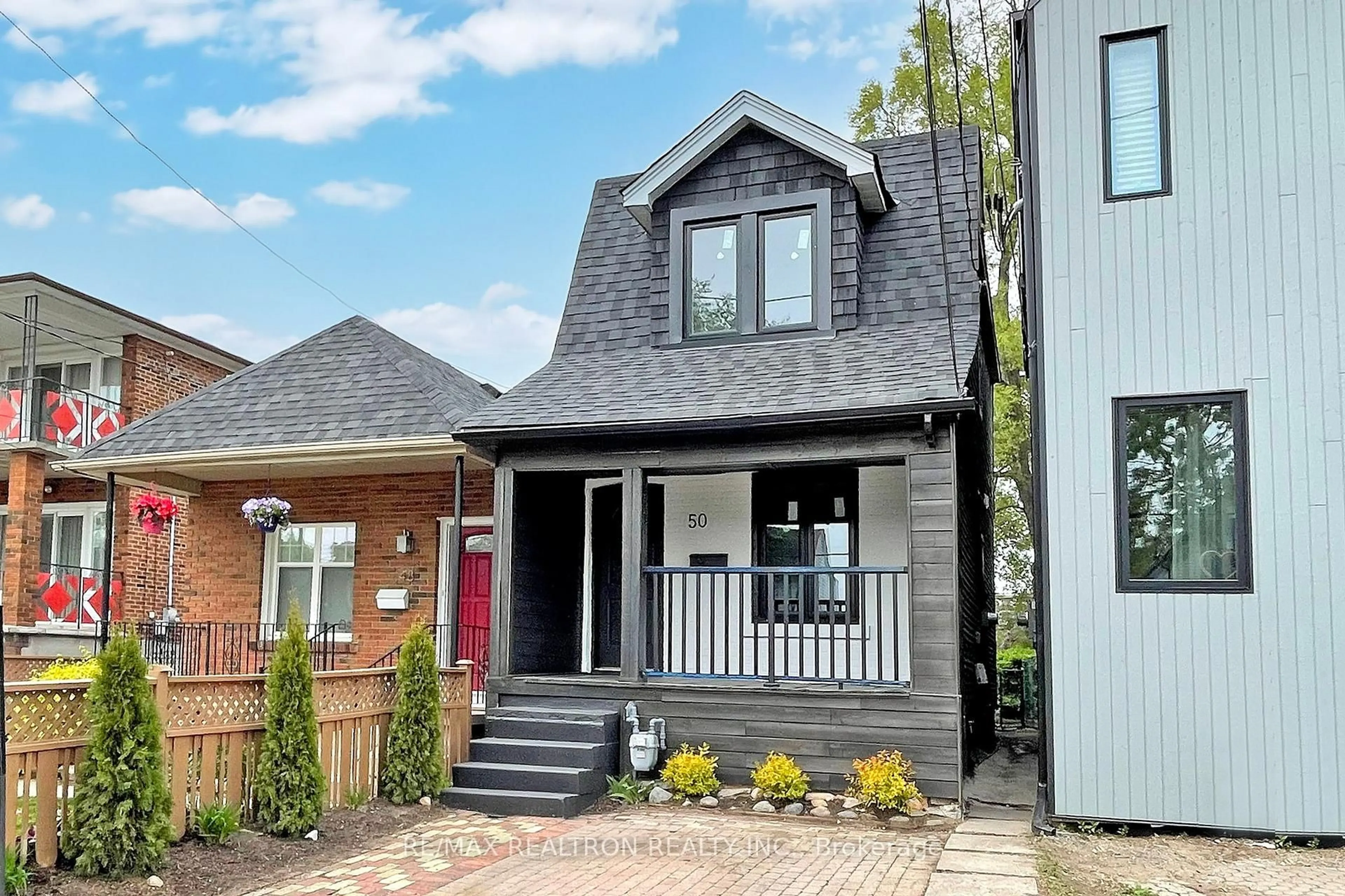 Home with brick exterior material, street for 50 King Edward Ave, Toronto Ontario M4C 5J6