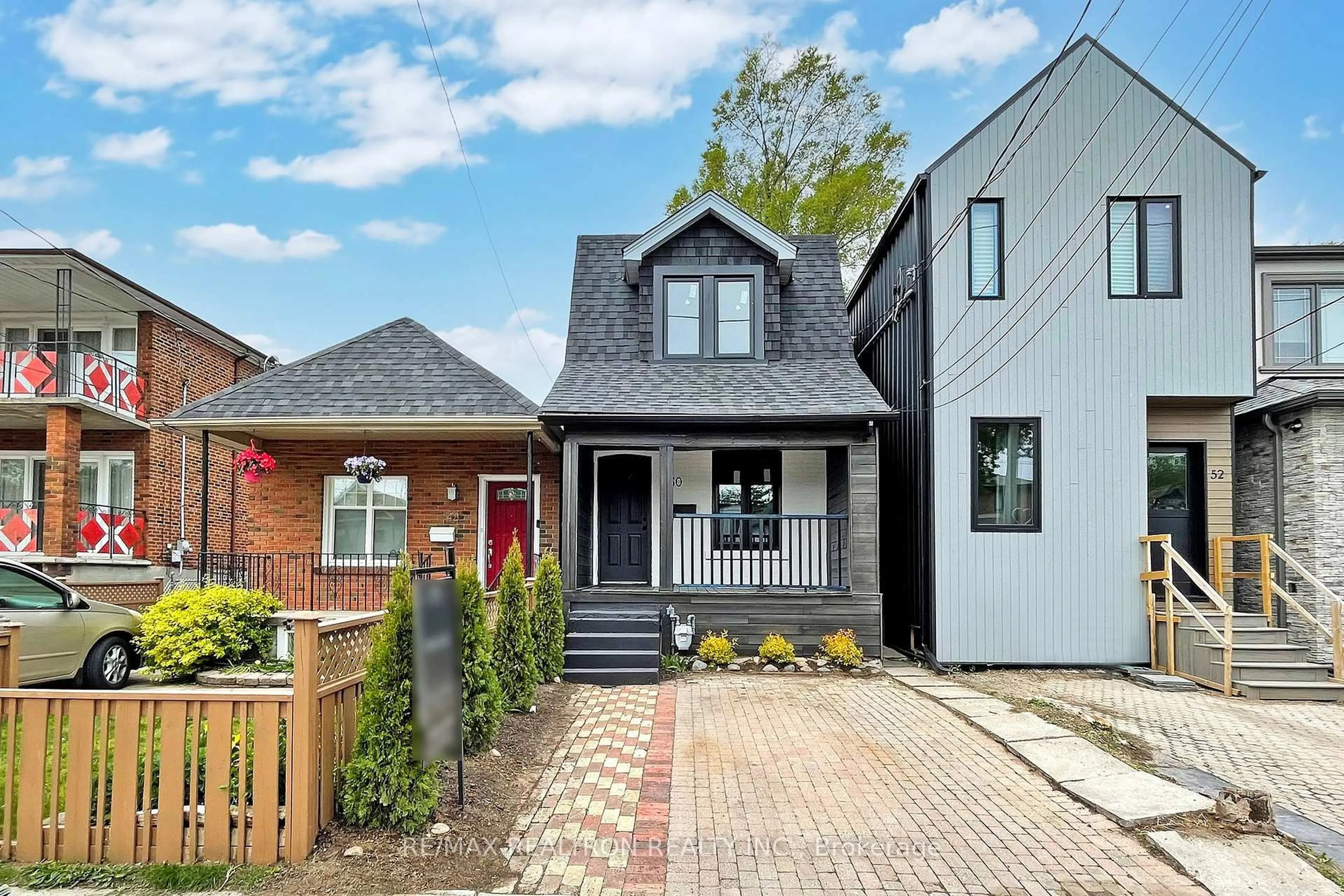 Home with brick exterior material, street for 50 King Edward Ave, Toronto Ontario M4C 5J6