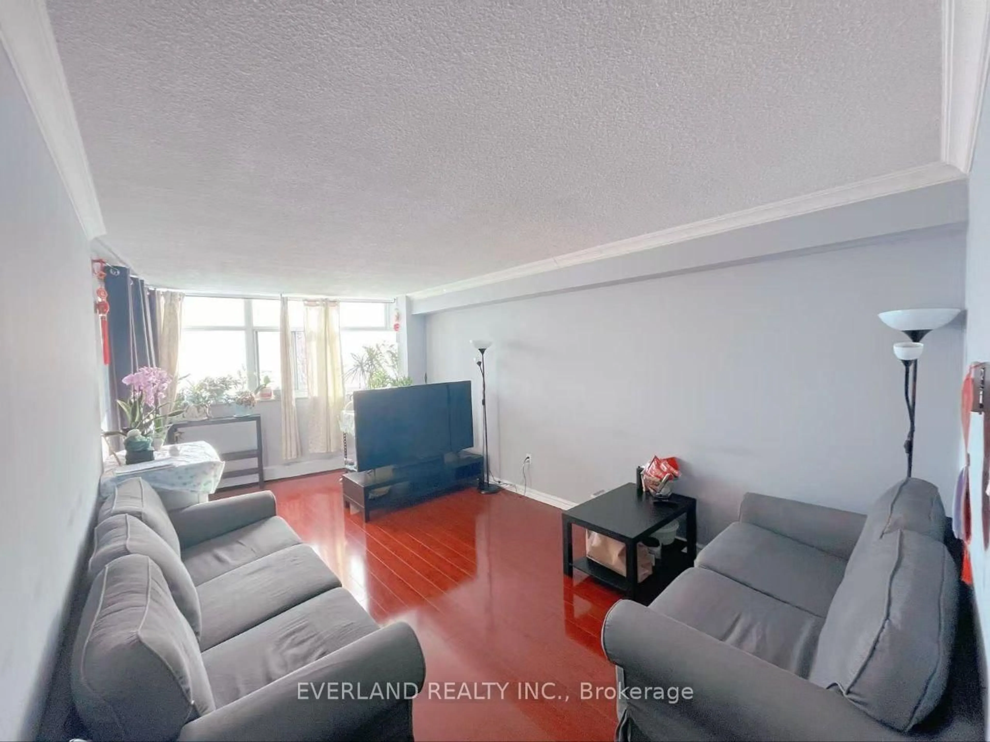 Living room with furniture, unknown for 2050 Bridletowne Circ #303, Toronto Ontario M1W 2V5