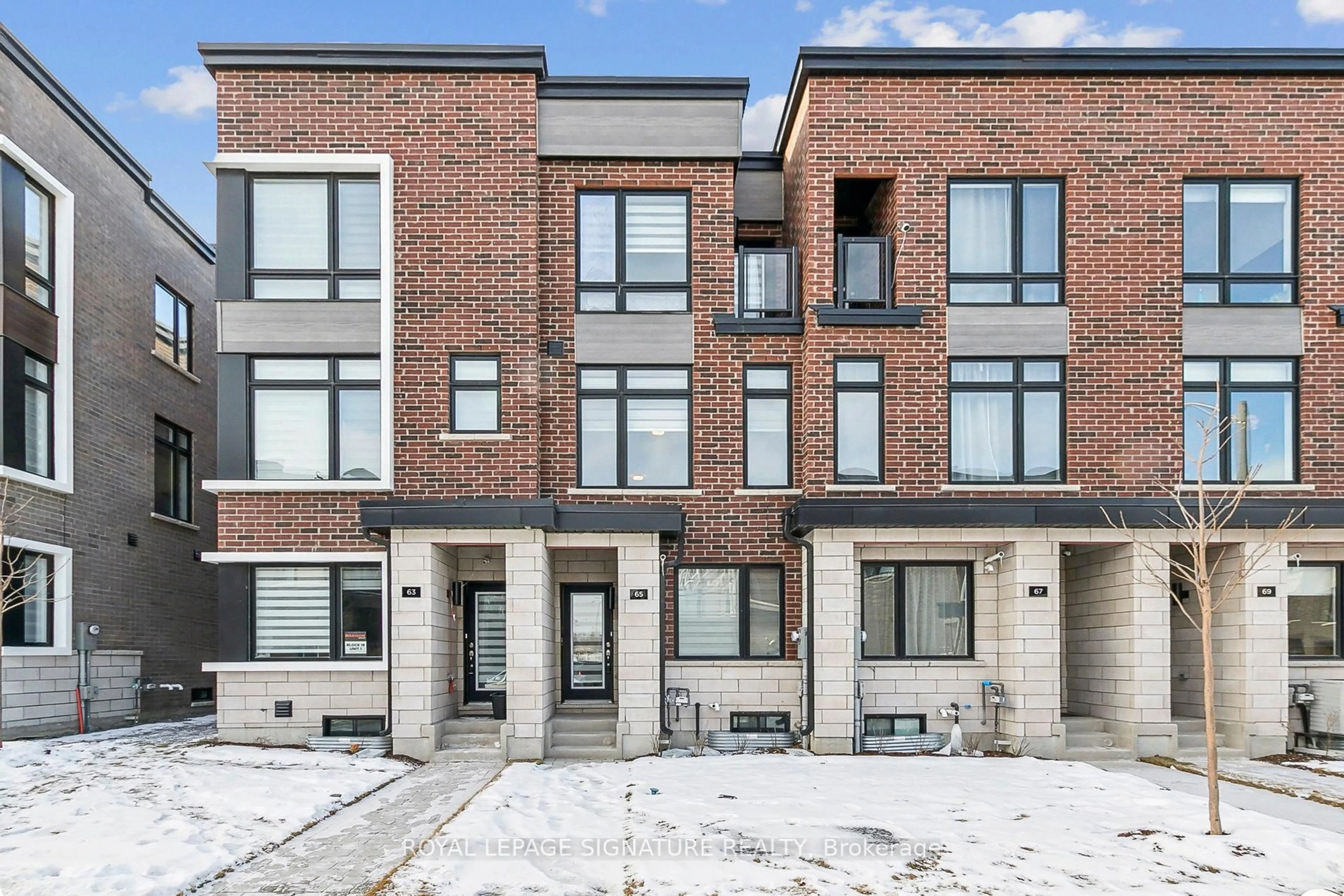 Home with brick exterior material, street for 65 Akil Thomas Gdns, Toronto Ontario M1P 3C1