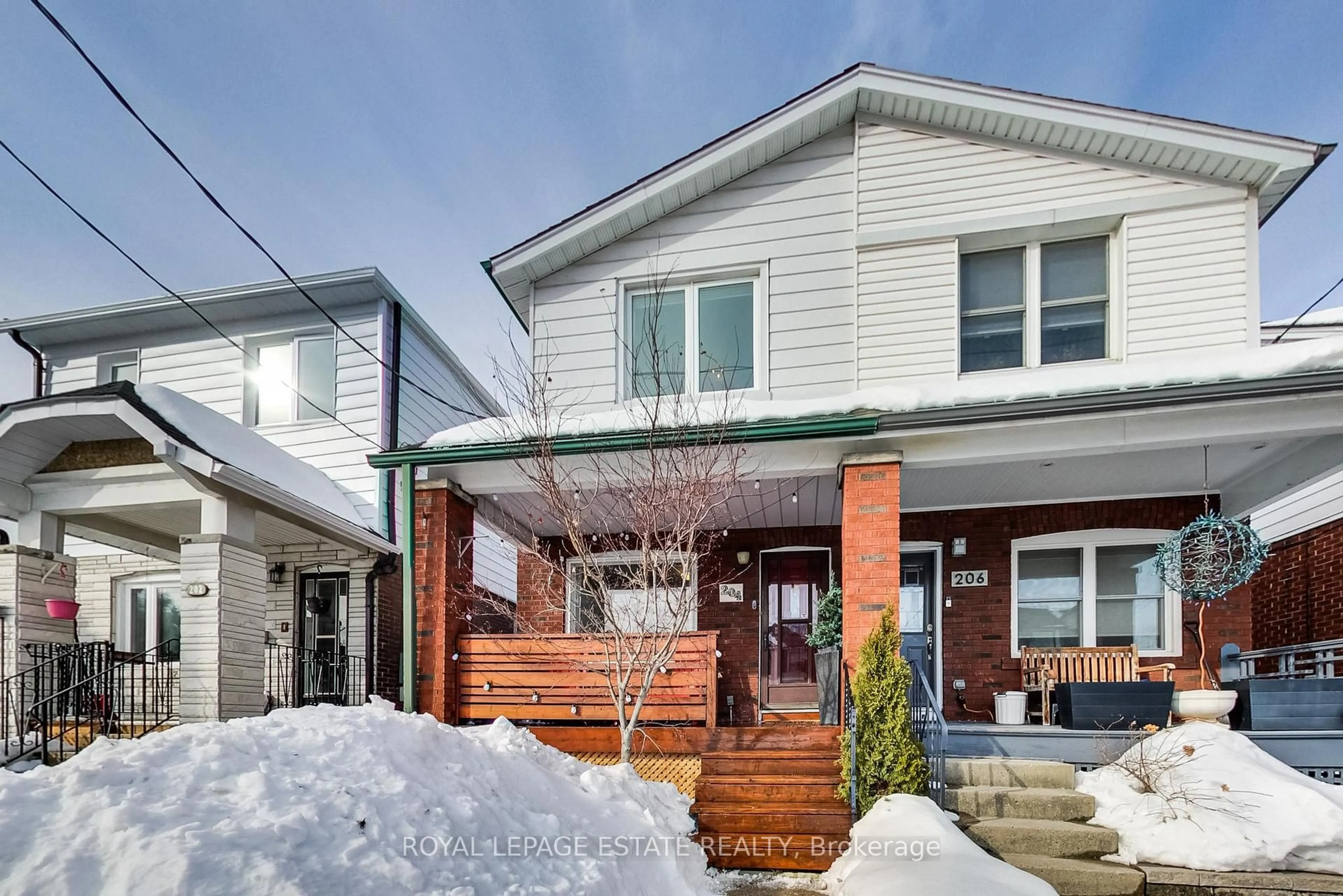 Home with brick exterior material, street for 204 Queensdale Ave, Toronto Ontario M4C 2A9