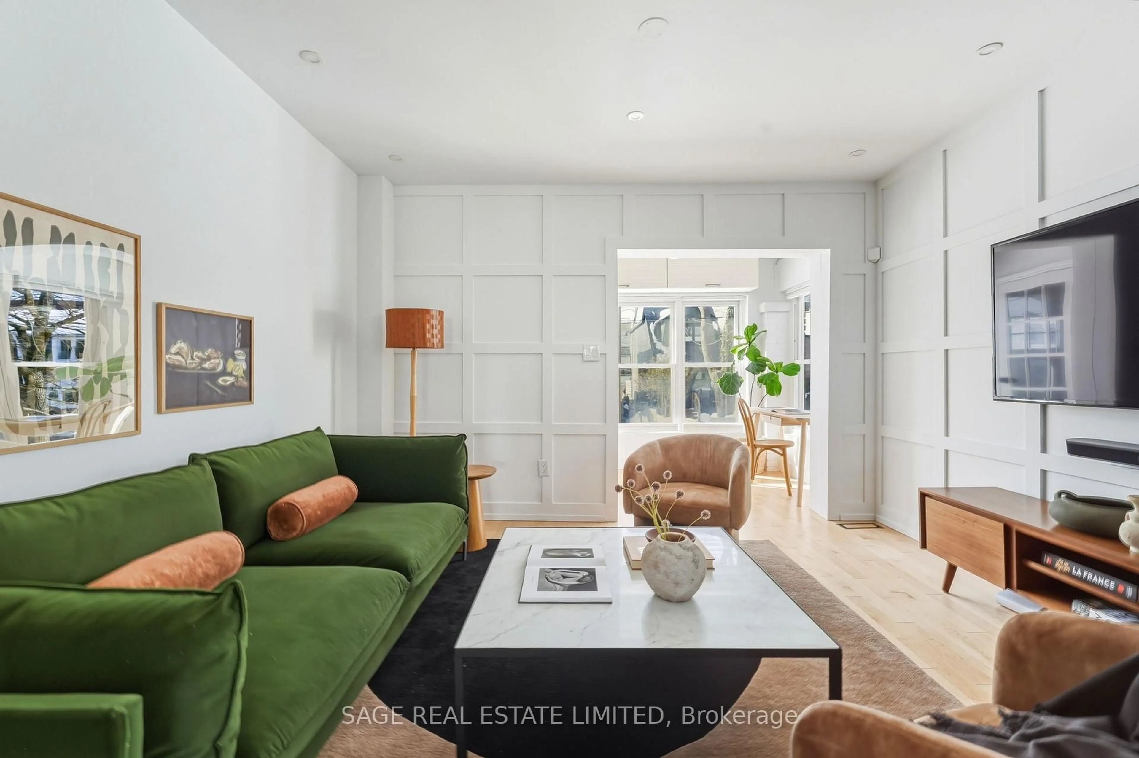 Living room with furniture, unknown for 107 Hiltz Ave, Toronto Ontario M4L 2N7