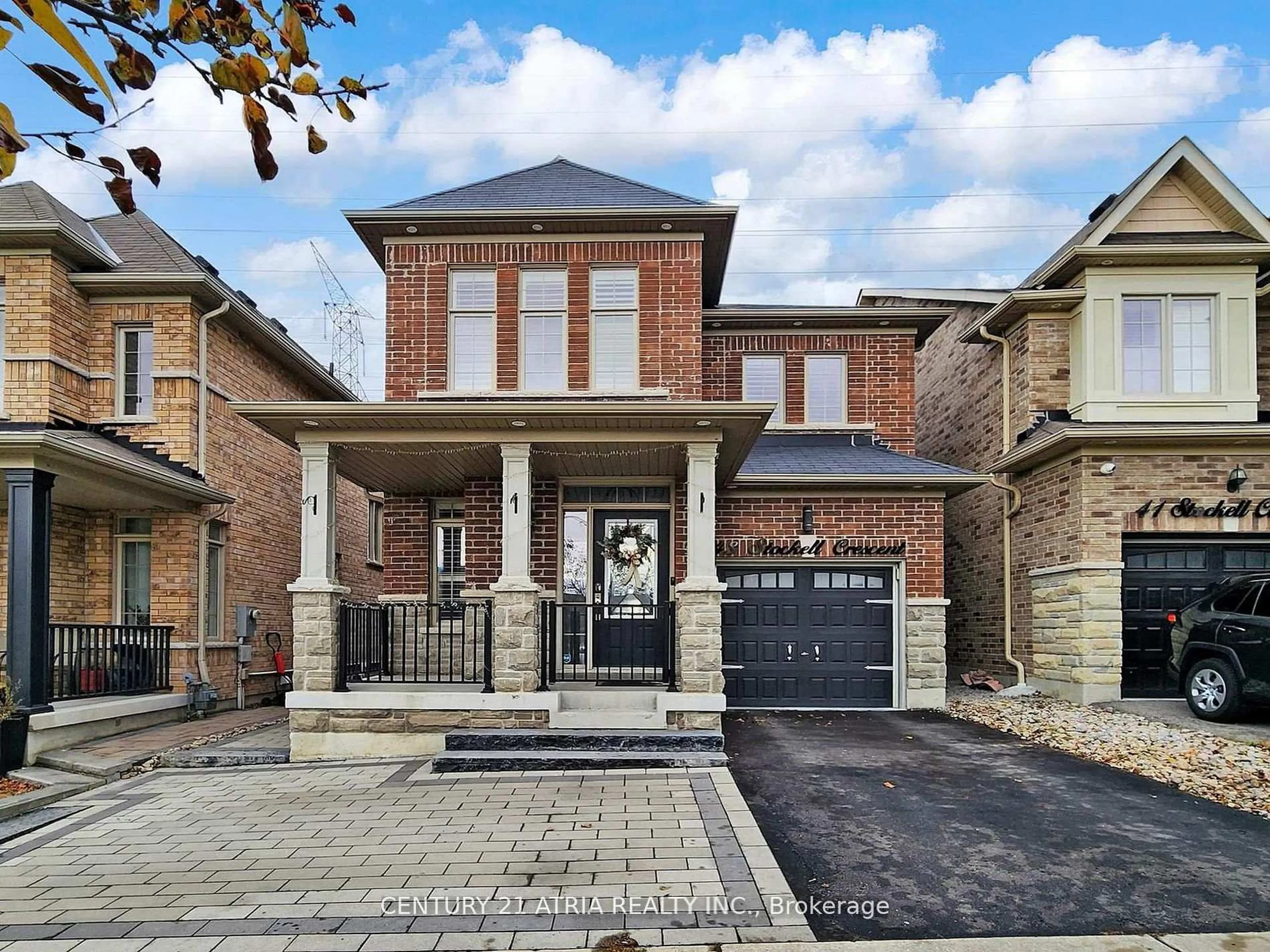 Home with brick exterior material, street for 43 Stockell Cres, Ajax Ontario L1T 4P8