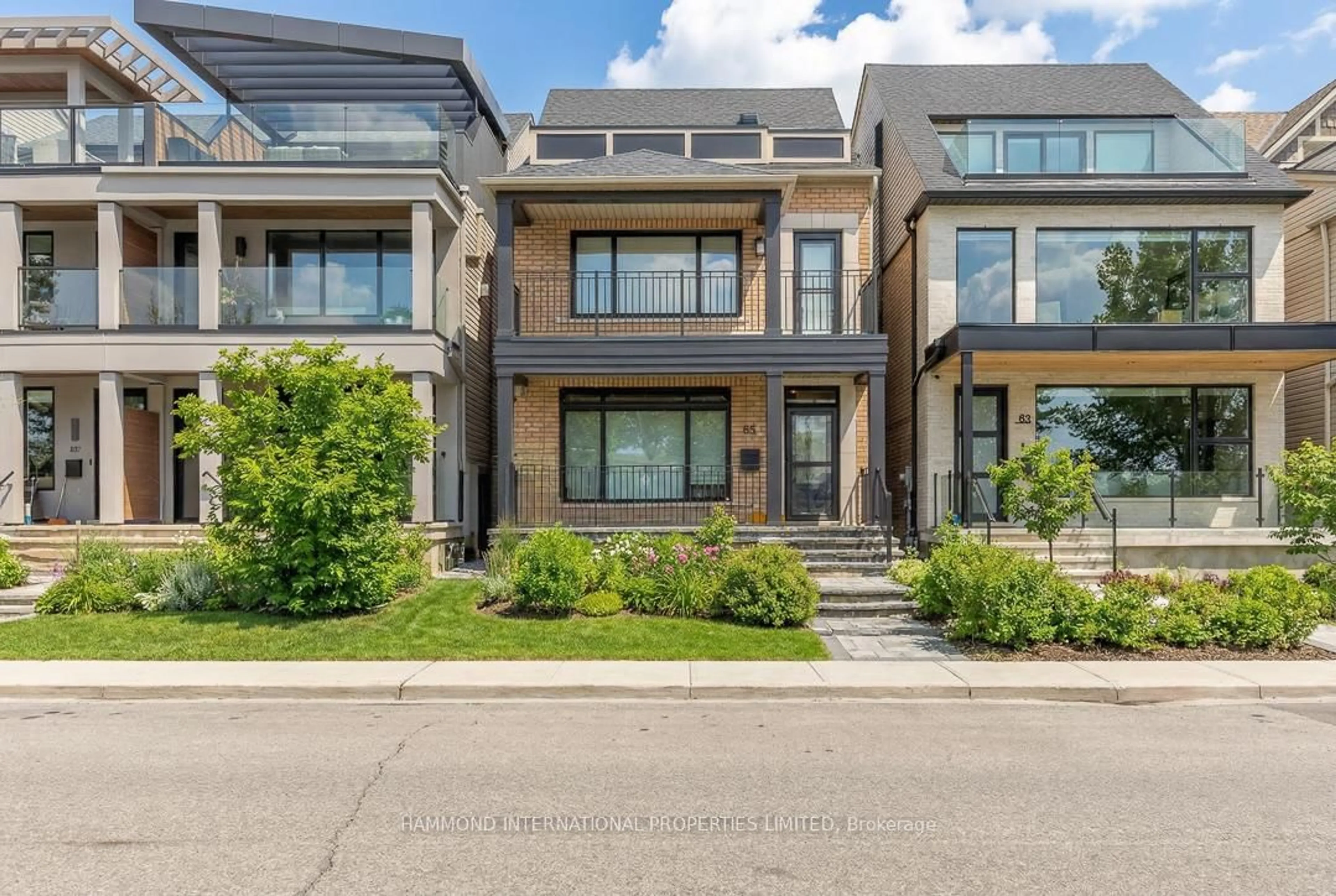 Home with brick exterior material, street for 85 Northern Dancer Blvd, Toronto Ontario M4L 3Z8