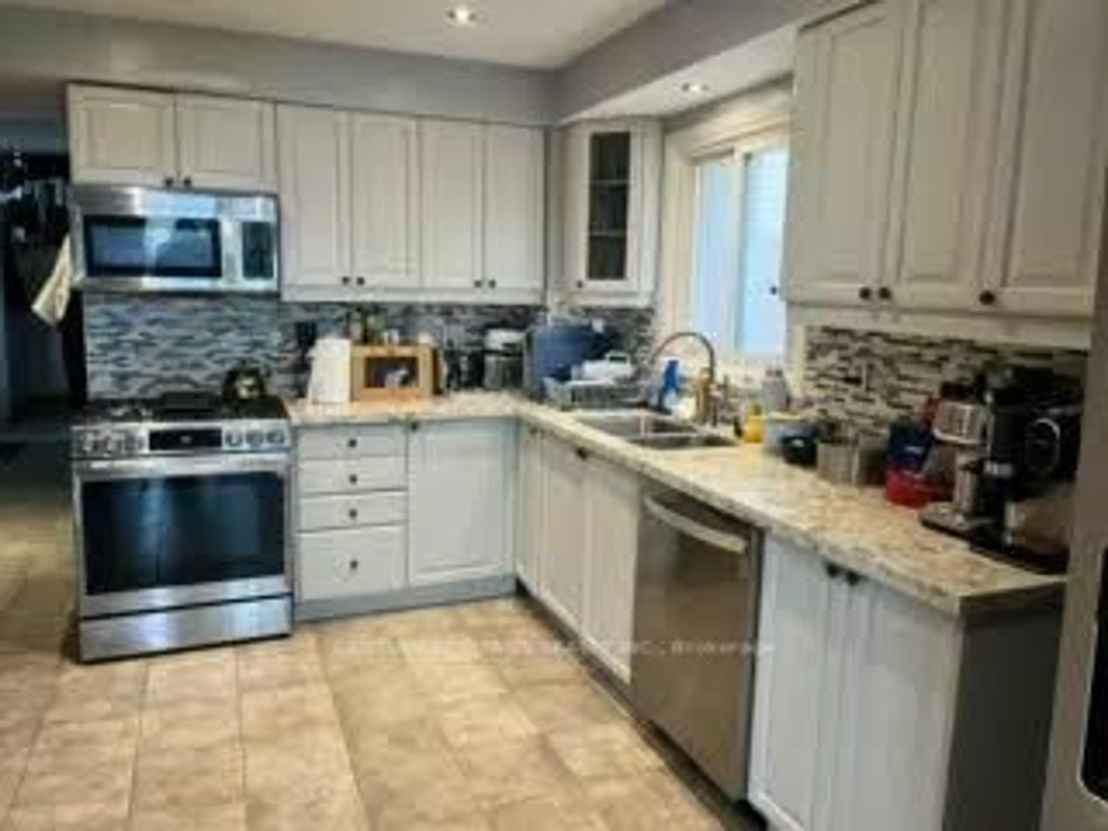 Open concept kitchen, ceramic/tile floor for 1640 Tawnberry St, Pickering Ontario L1X 2C2