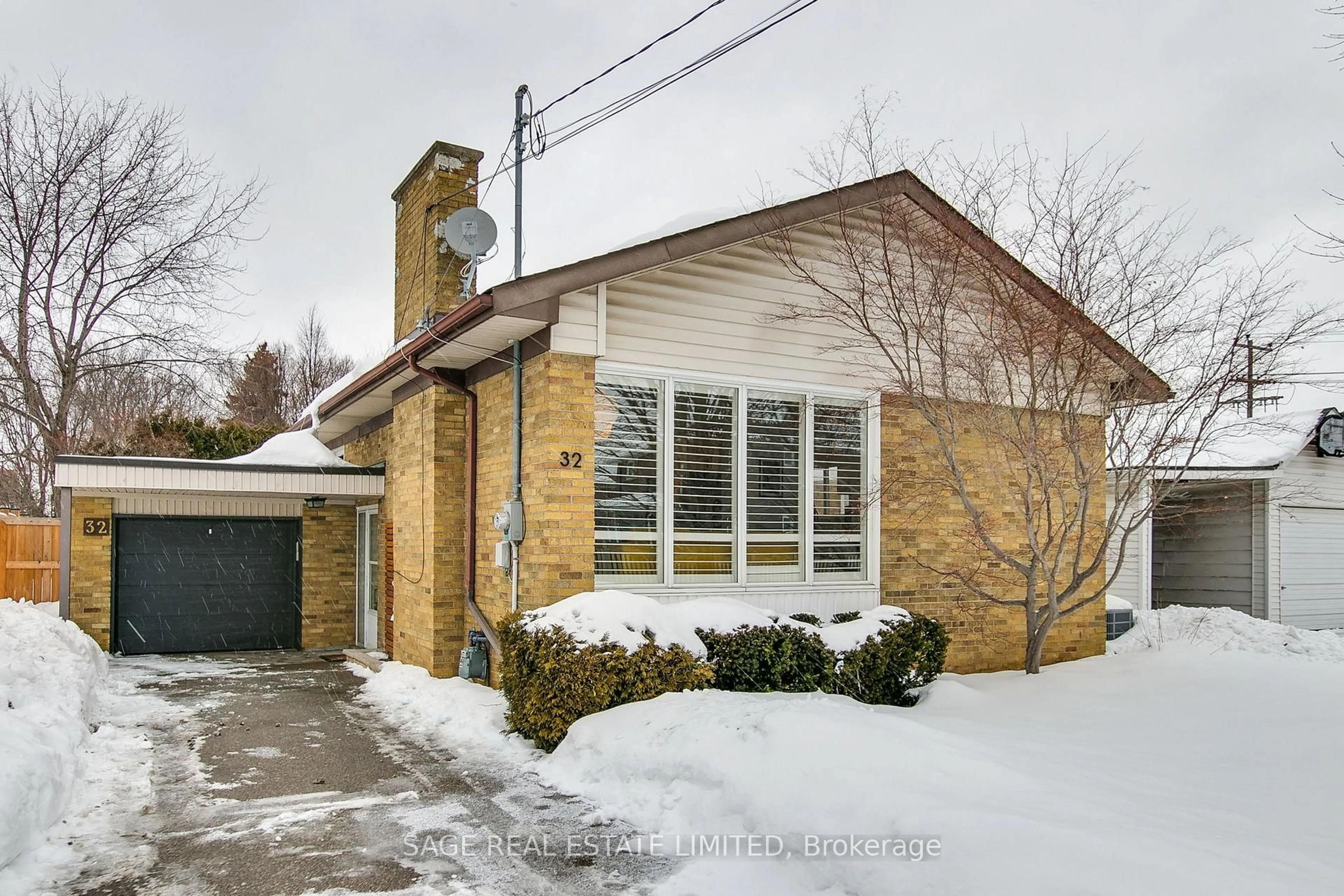 Home with brick exterior material, street for 32 Sherwood Ave, Toronto Ontario M1R 1N3