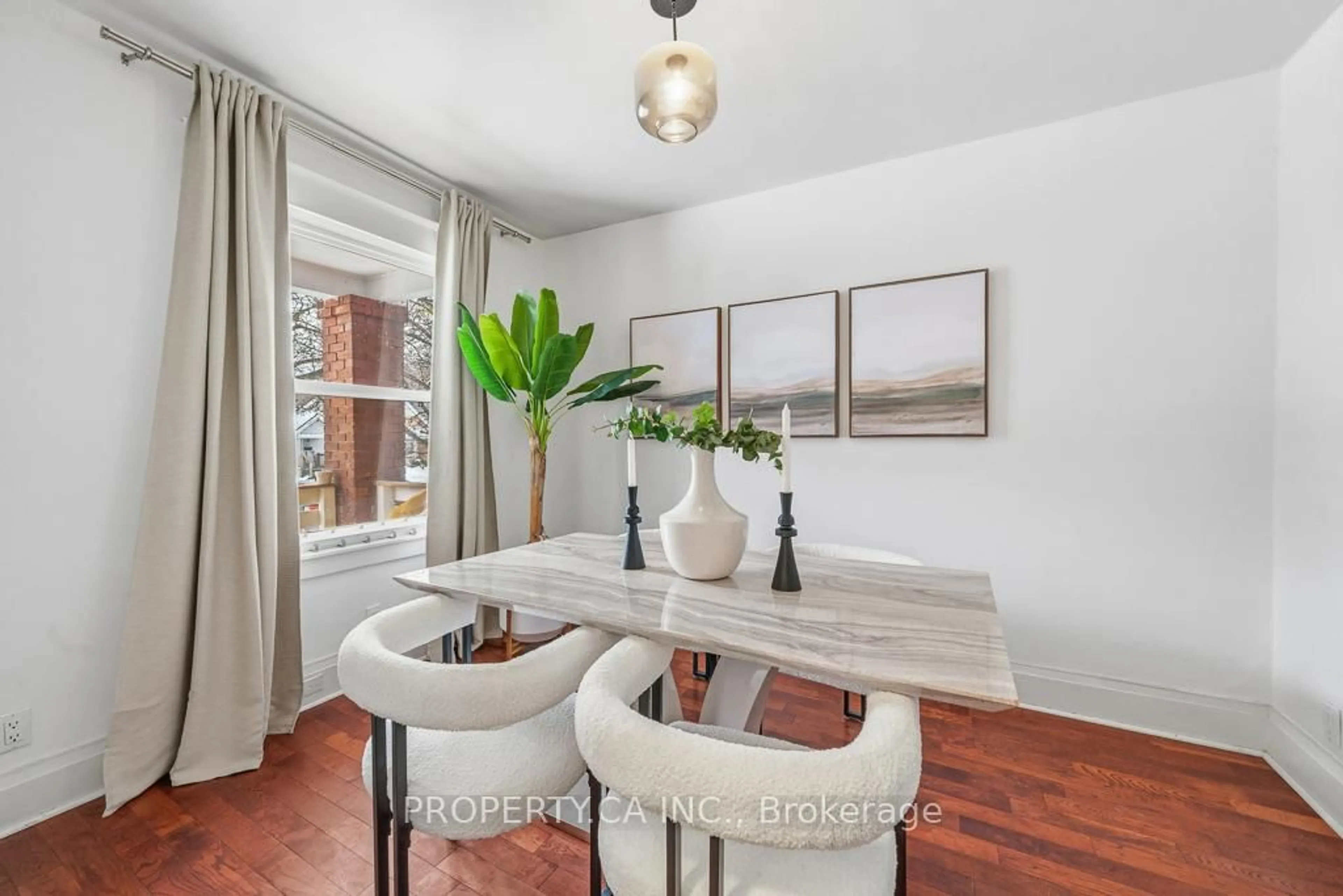 Dining room, wood/laminate floor for 146 King Edward Ave, Toronto Ontario M4C 5J8