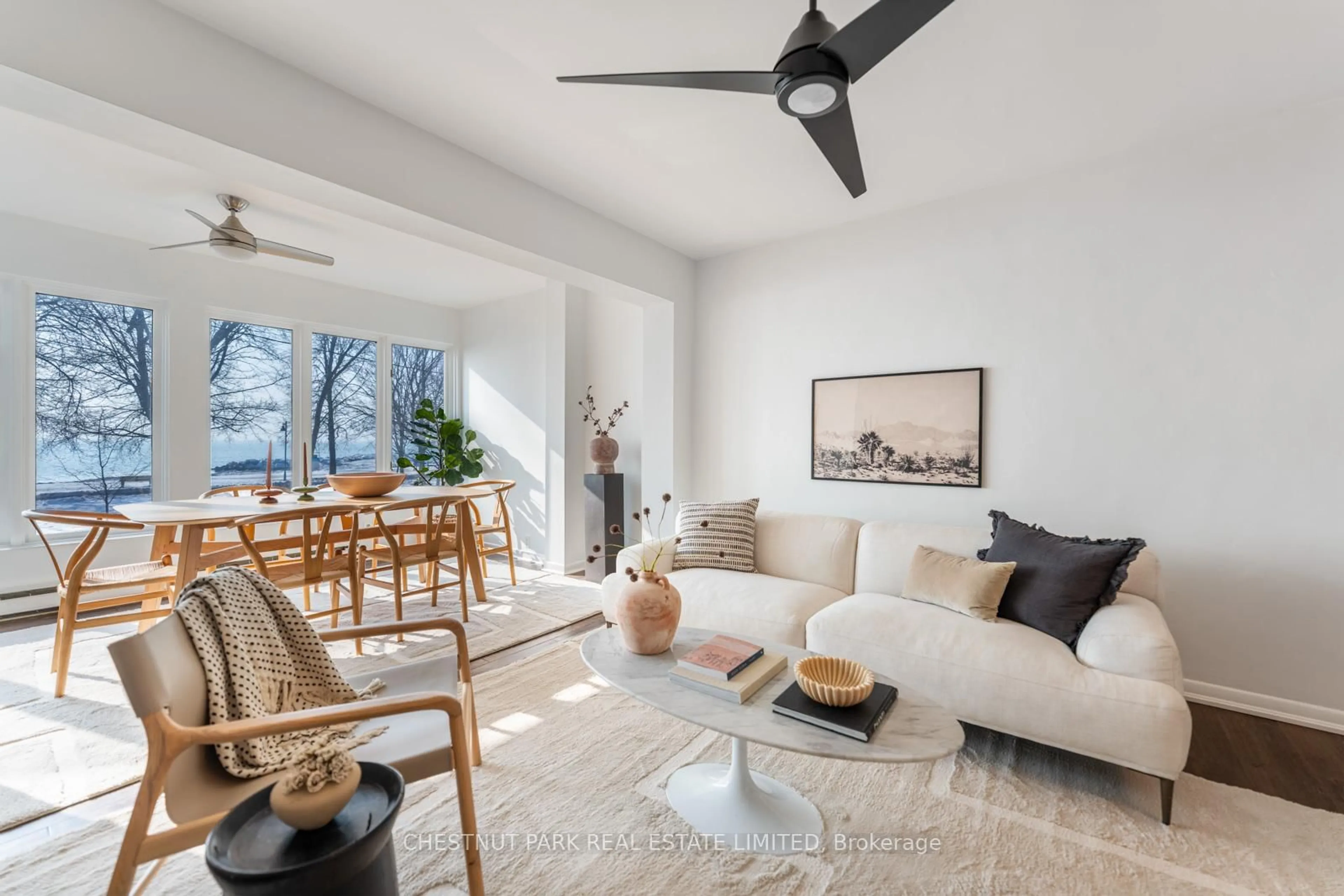 Living room with furniture, unknown for 108 Hubbard Blvd, Toronto Ontario M4E 1A6