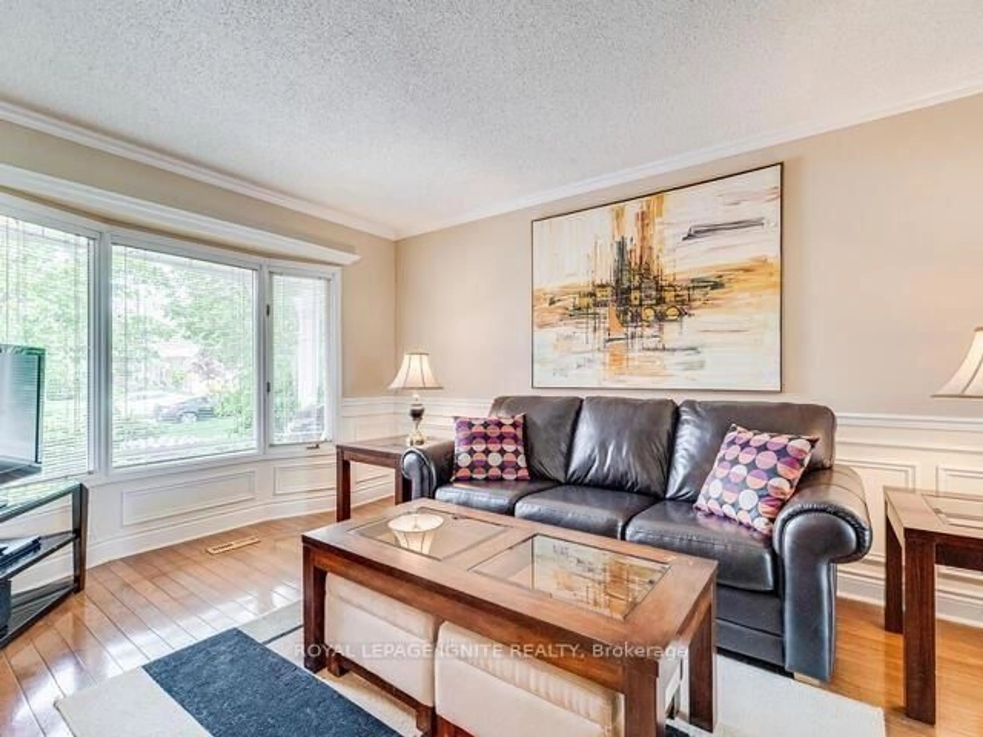 Living room with furniture, wood/laminate floor for 1144 Thimbleberry Circ, Oshawa Ontario L1K 2H1