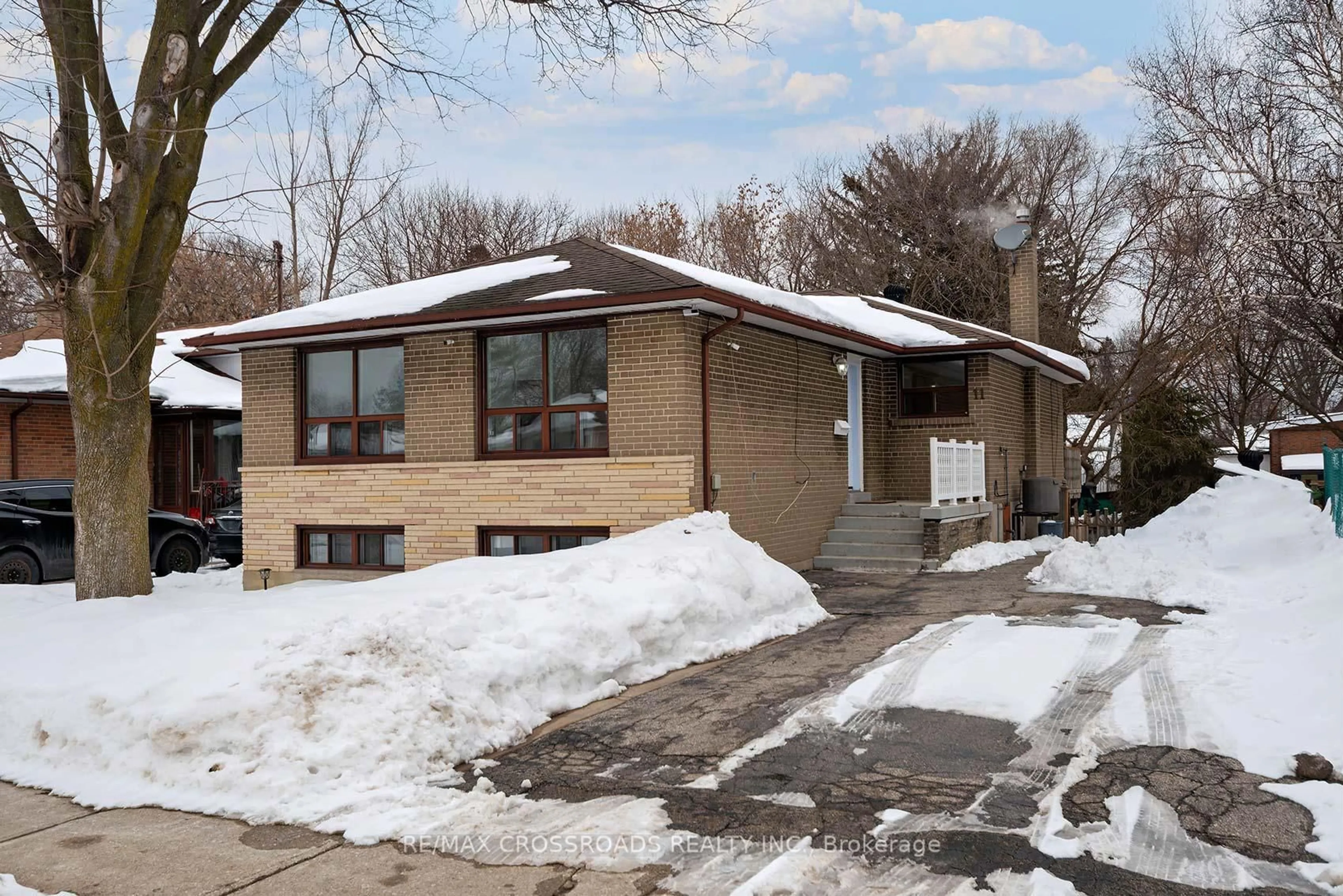 Home with brick exterior material, street for 11 Brightside Dr, Toronto Ontario M1E 3Y8