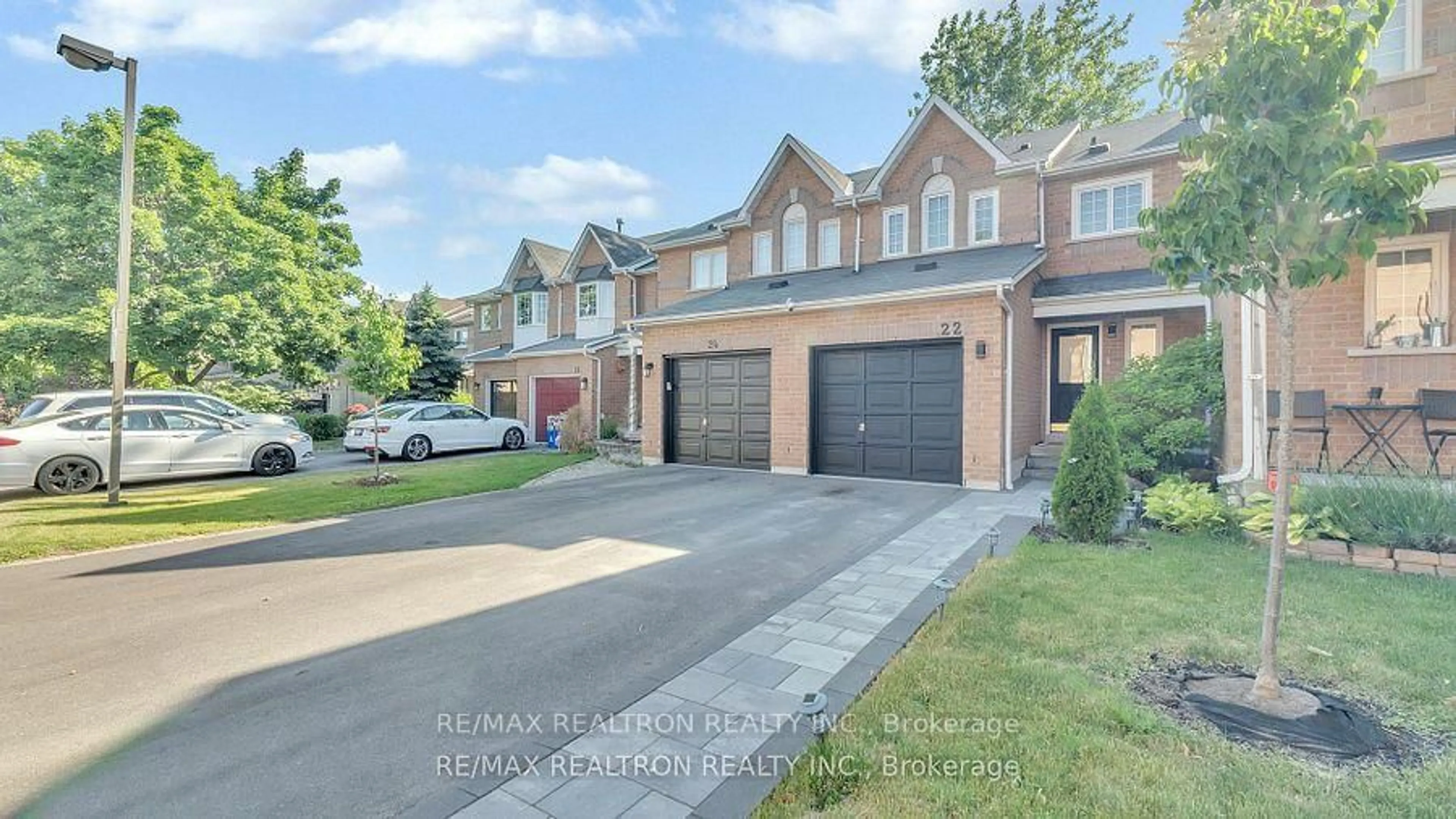 Home with brick exterior material, street for 22 Macintyre Lane, Ajax Ontario L1T 3X3