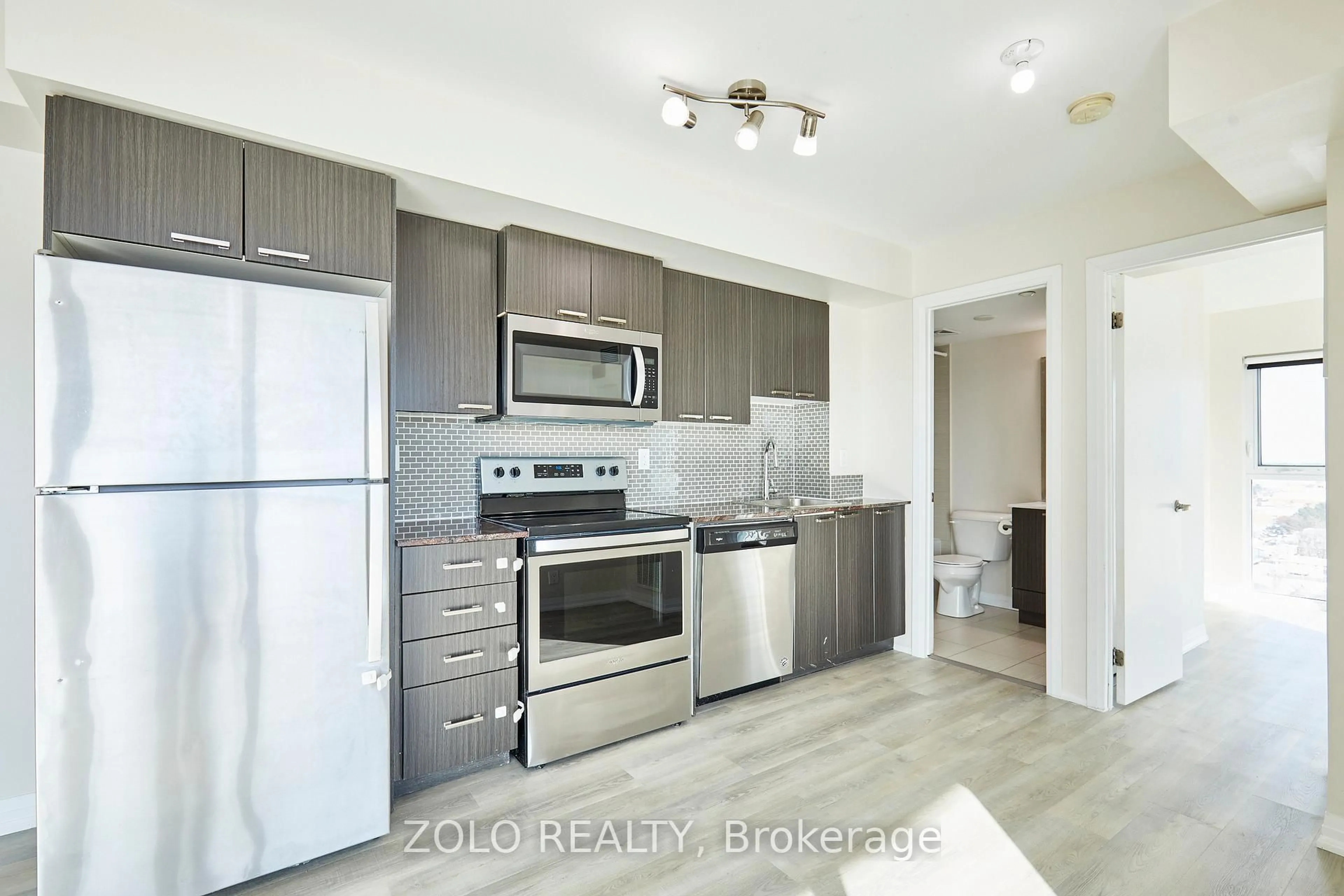 Standard kitchen, wood/laminate floor for 2150 Lawrence Ave #1703, Toronto Ontario M1R 3A7