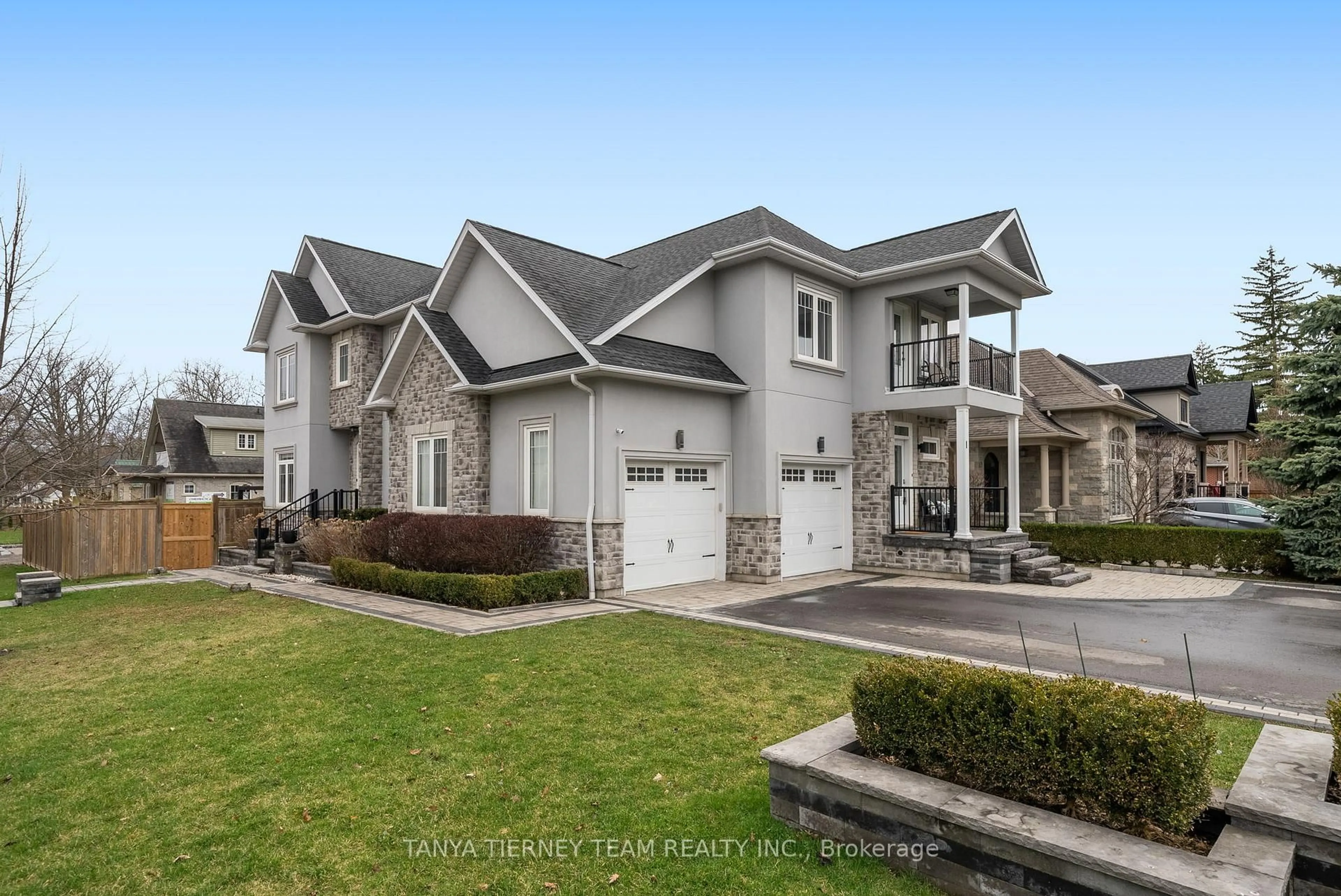 Home with vinyl exterior material, street for 1 Centre St, Whitby Ontario L1M 1C1