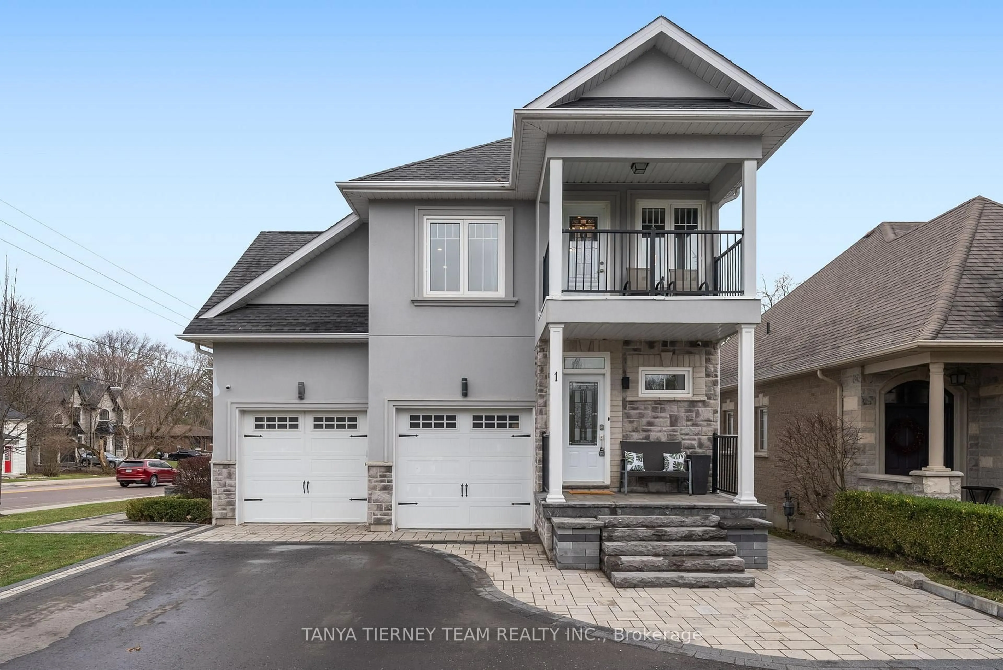 Home with vinyl exterior material, street for 1 Centre St, Whitby Ontario L1M 1C1