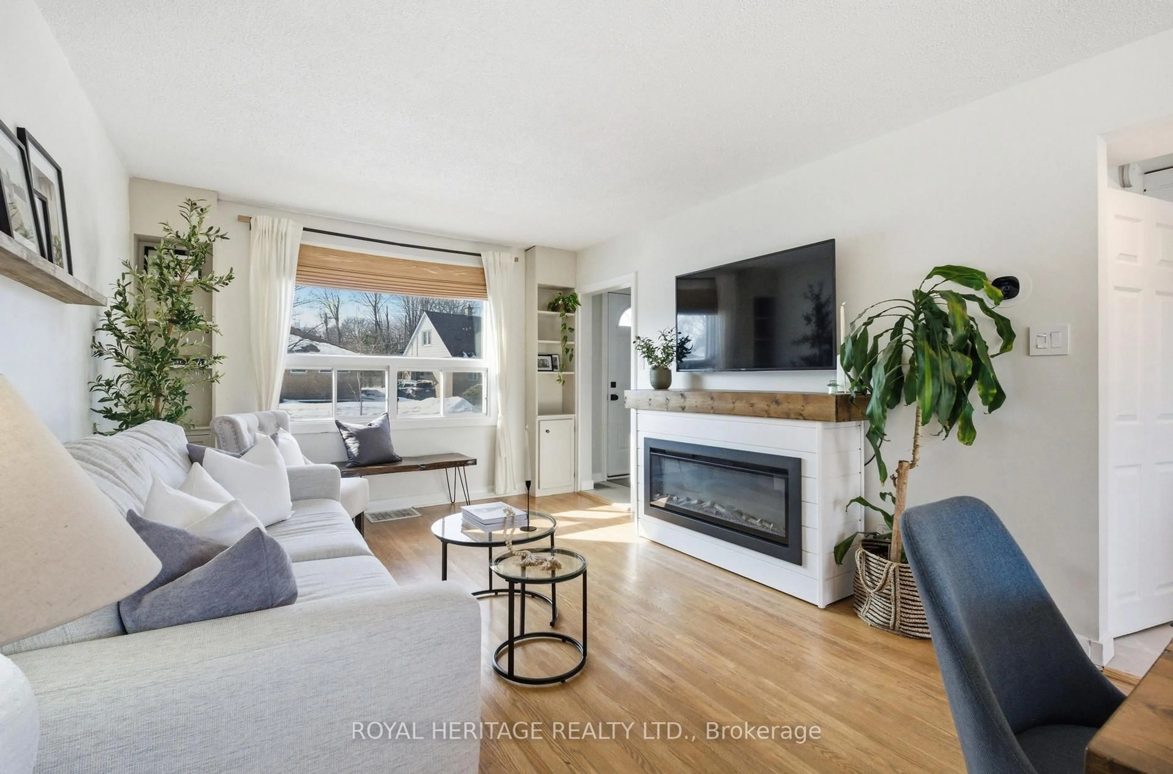 Living room with furniture, wood/laminate floor for 36 Forest Rd, Ajax Ontario L1S 2N3