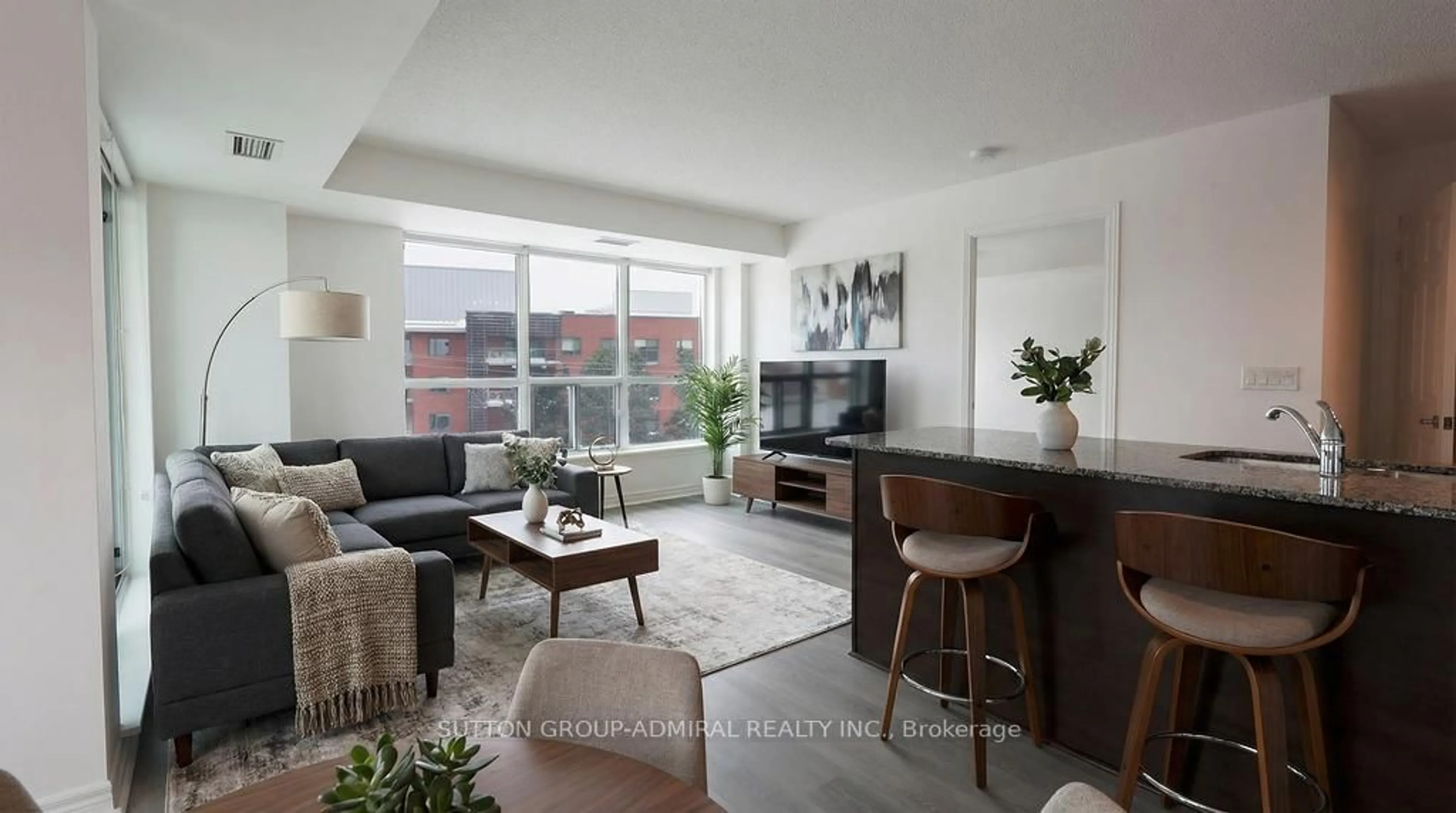 Living room with furniture, unknown for 60 Fairfax Cres #409, Toronto Ontario M1L 0E1