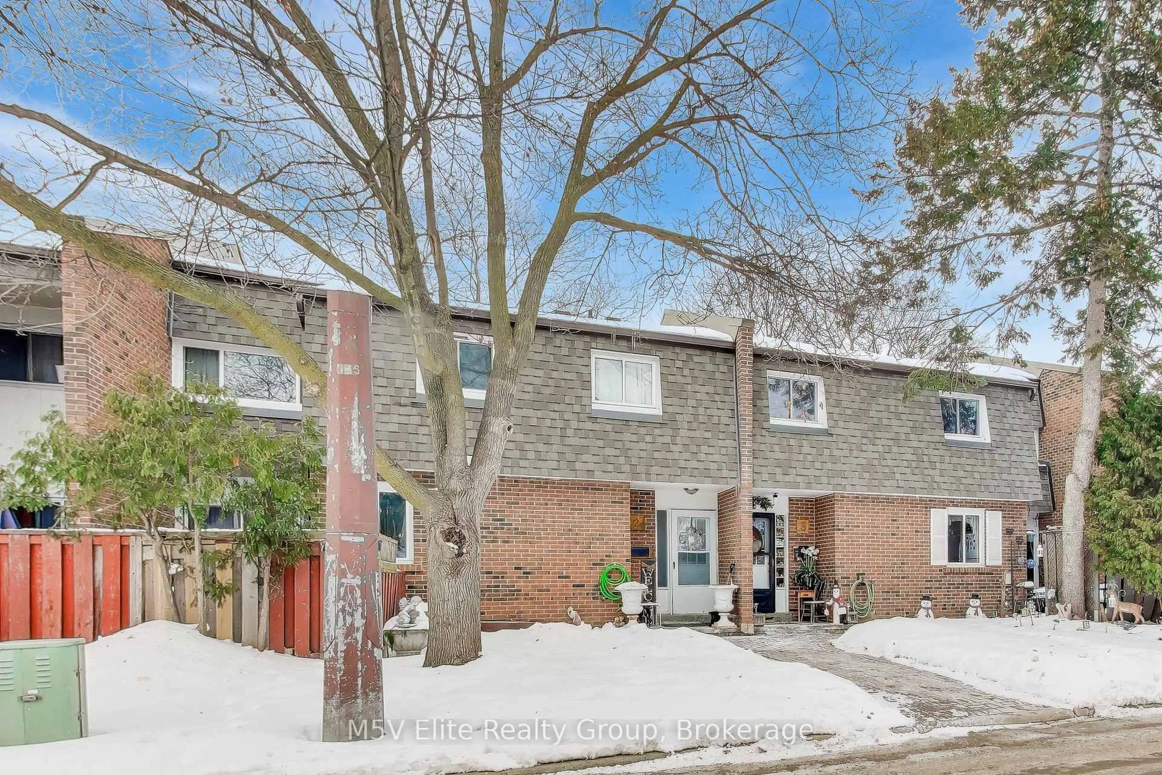 Home with brick exterior material, street for 105 Dovedale Dr #2, Whitby Ontario L1N 1Z7