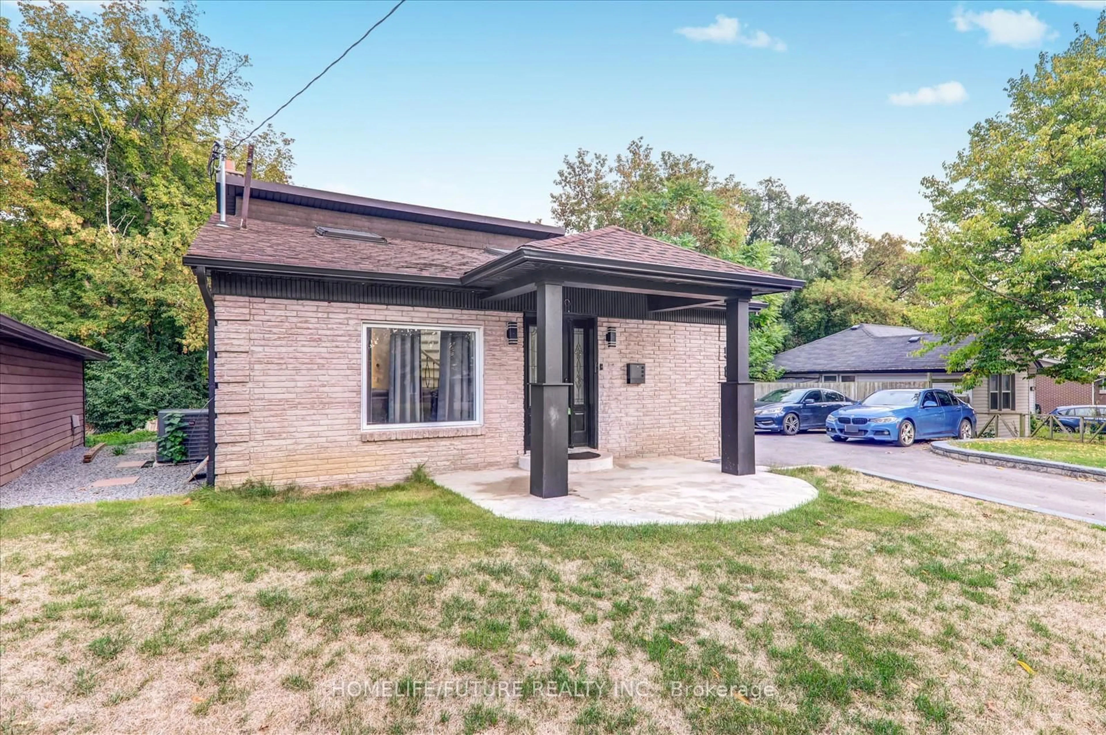 Home with brick exterior material, street for 585 Wilson Rd, Oshawa Ontario L1G 6E8