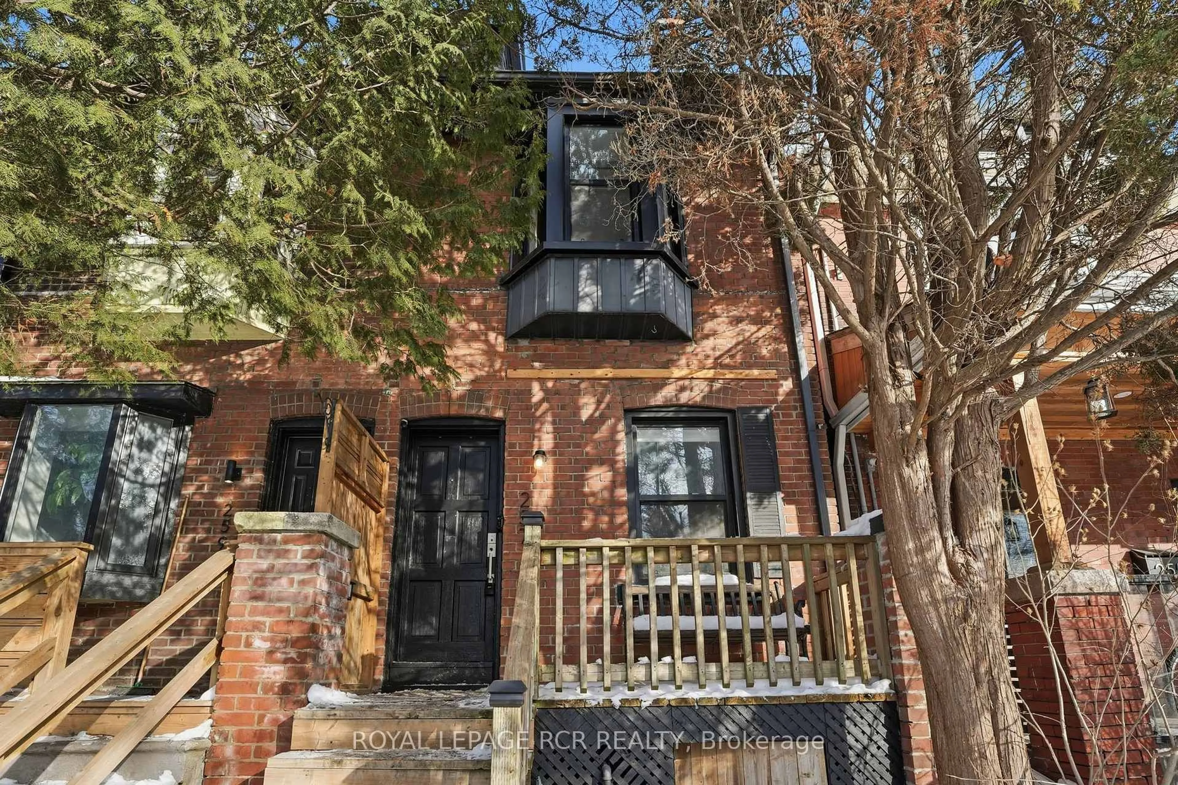 Home with brick exterior material, street for 257 Rhodes Ave, Toronto Ontario M4L 3A2