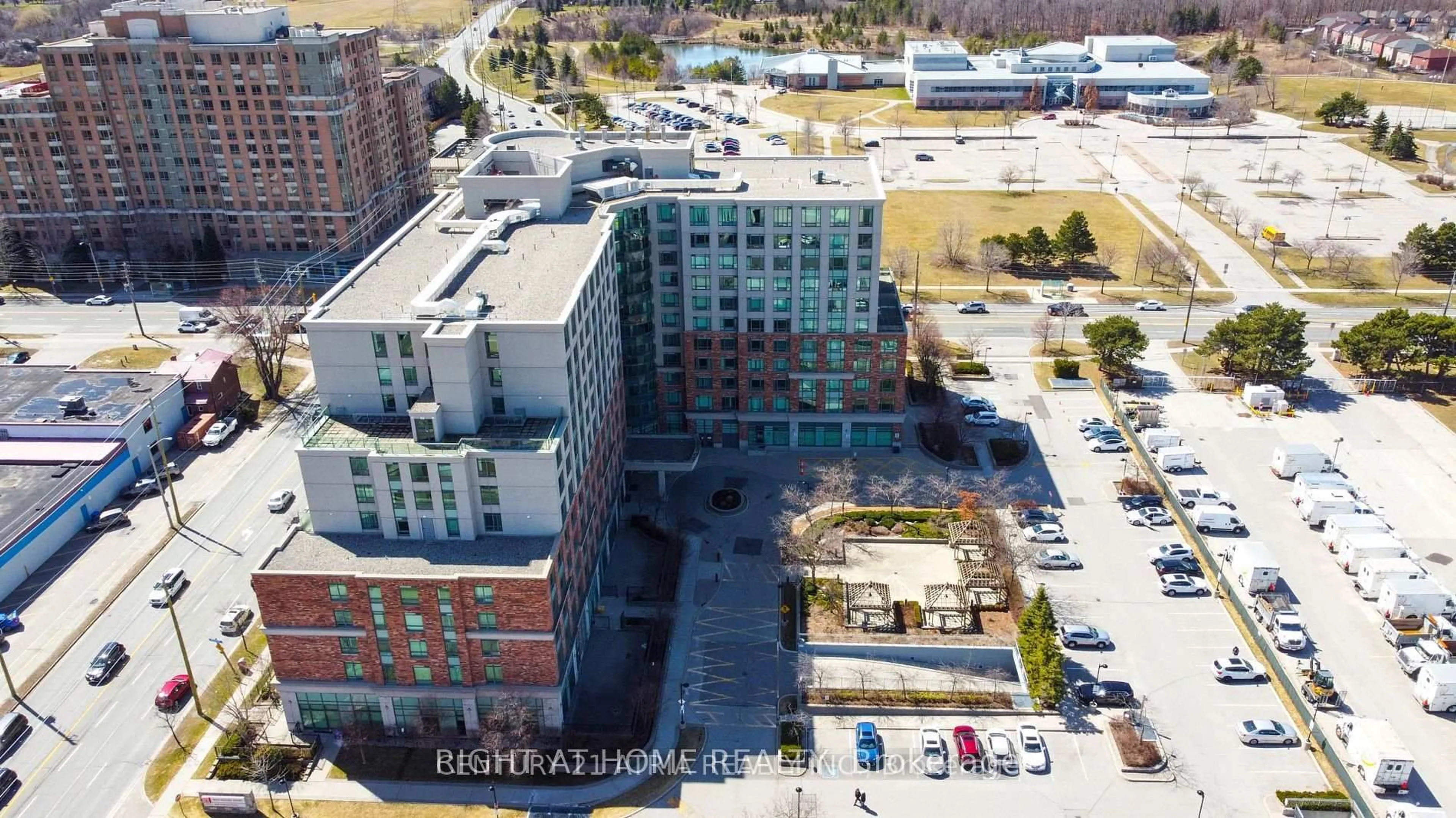 A pic from outside/outdoor area/front of a property/back of a property/a pic from drone, city buildings view from balcony for 2020 Mcnicoll Ave #719, Toronto Ontario M1V 0B5