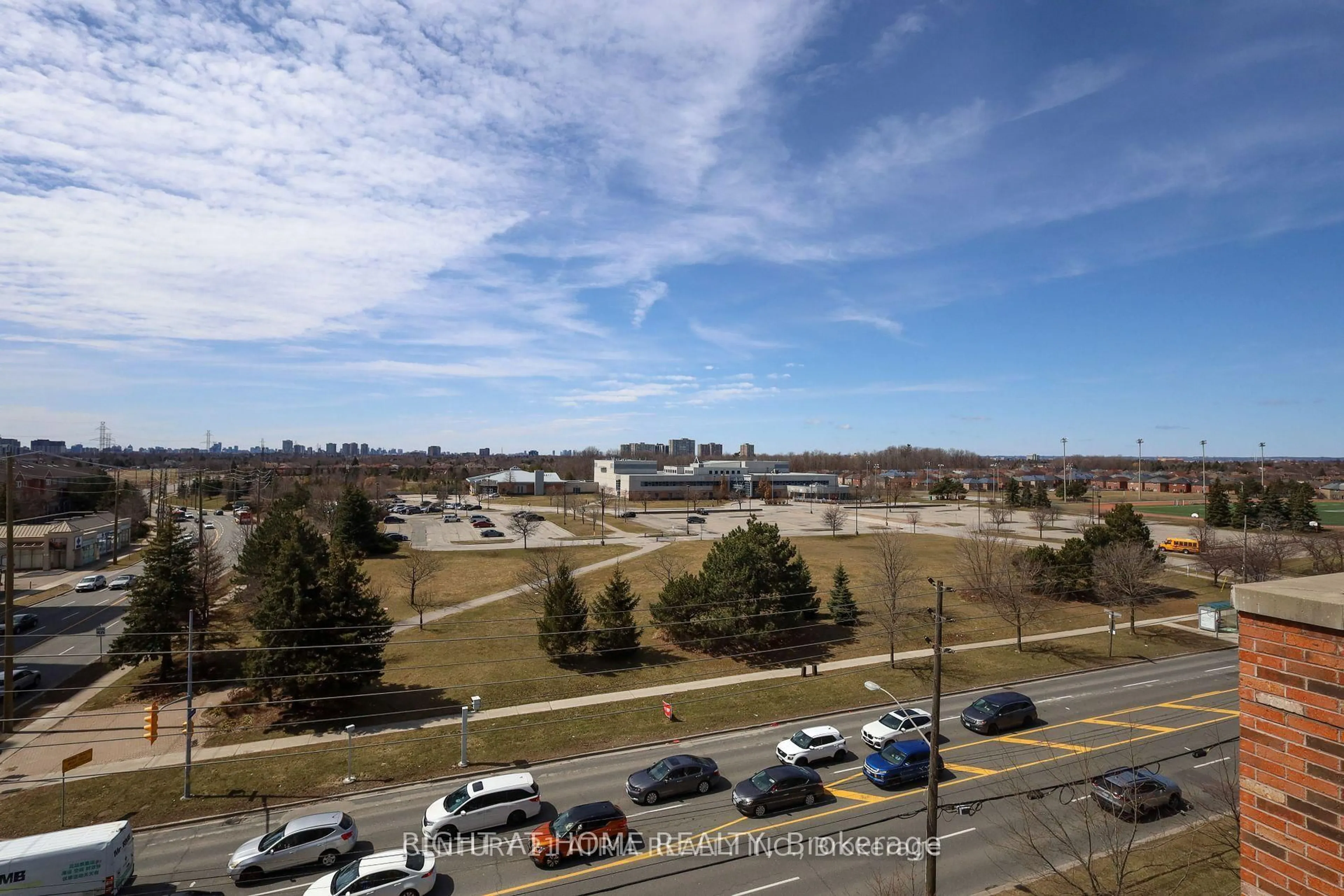 A pic from outside/outdoor area/front of a property/back of a property/a pic from drone, city buildings view from balcony for 2020 Mcnicoll Ave #719, Toronto Ontario M1V 0B5