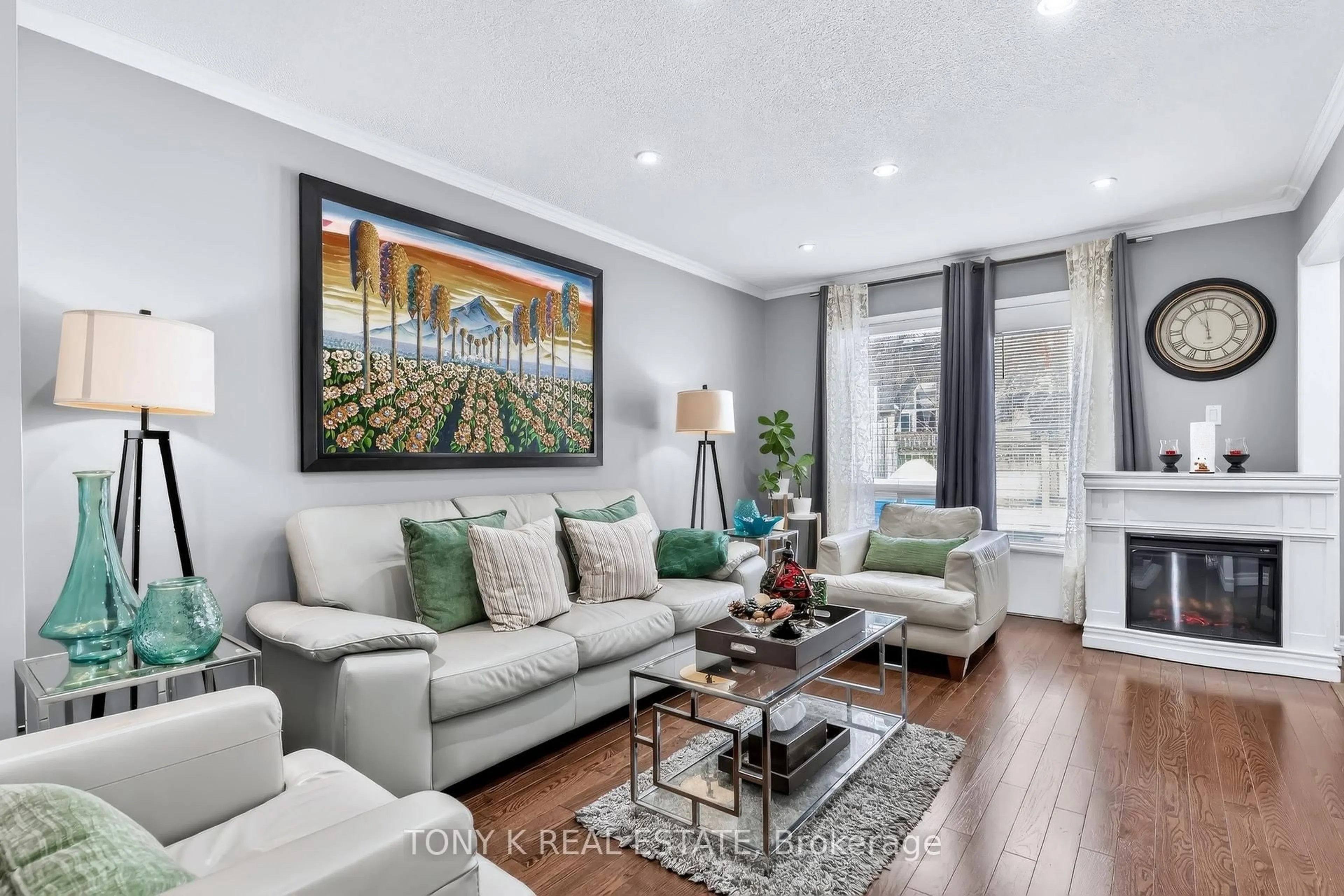 Living room with furniture, wood/laminate floor for 90 Crockamhill Dr #37, Toronto Ontario M1S 2K9