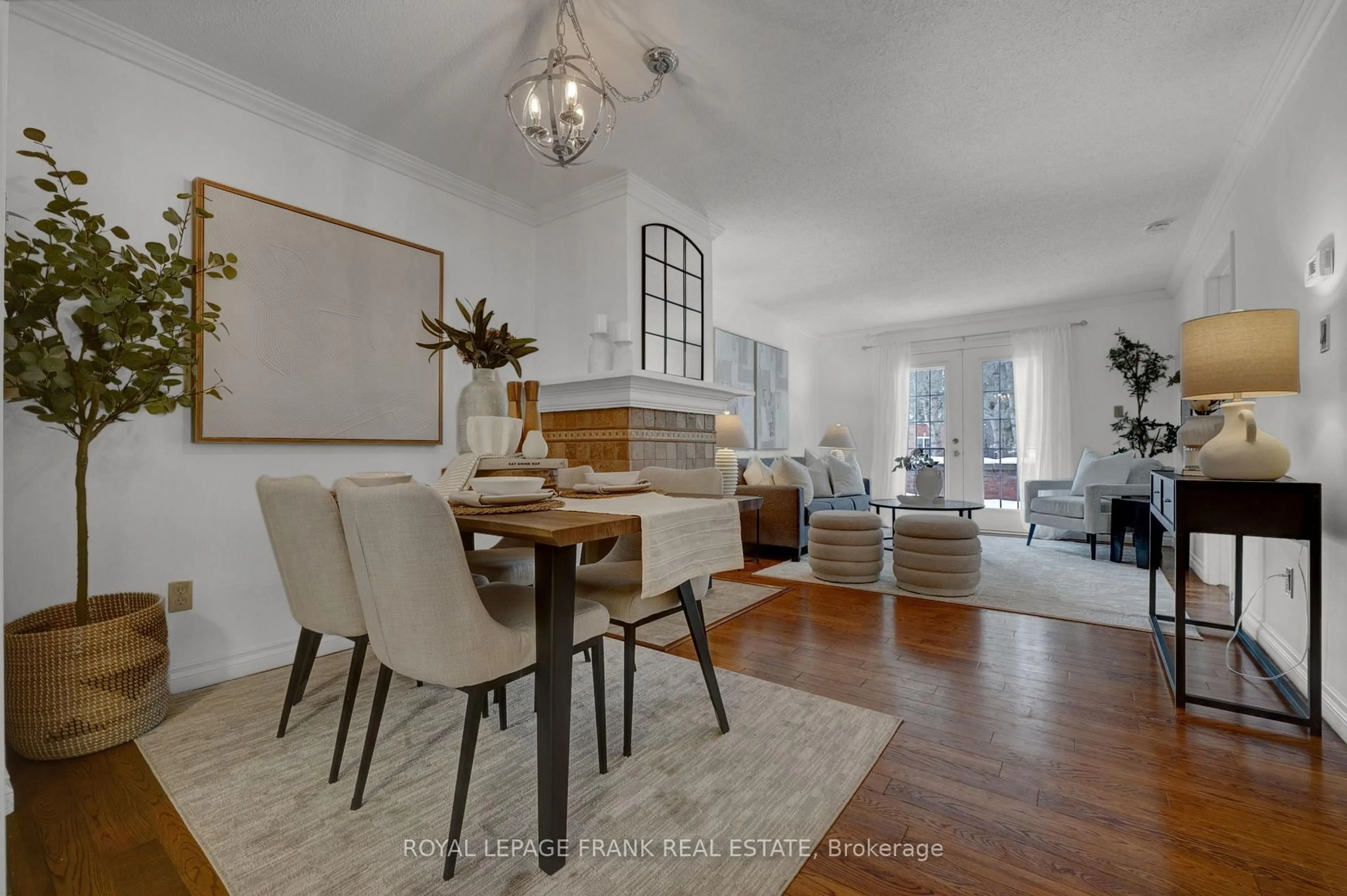 Living room with furniture, wood/laminate floor for 1663 Nash Rd #D10, Clarington Ontario L1E 1S8