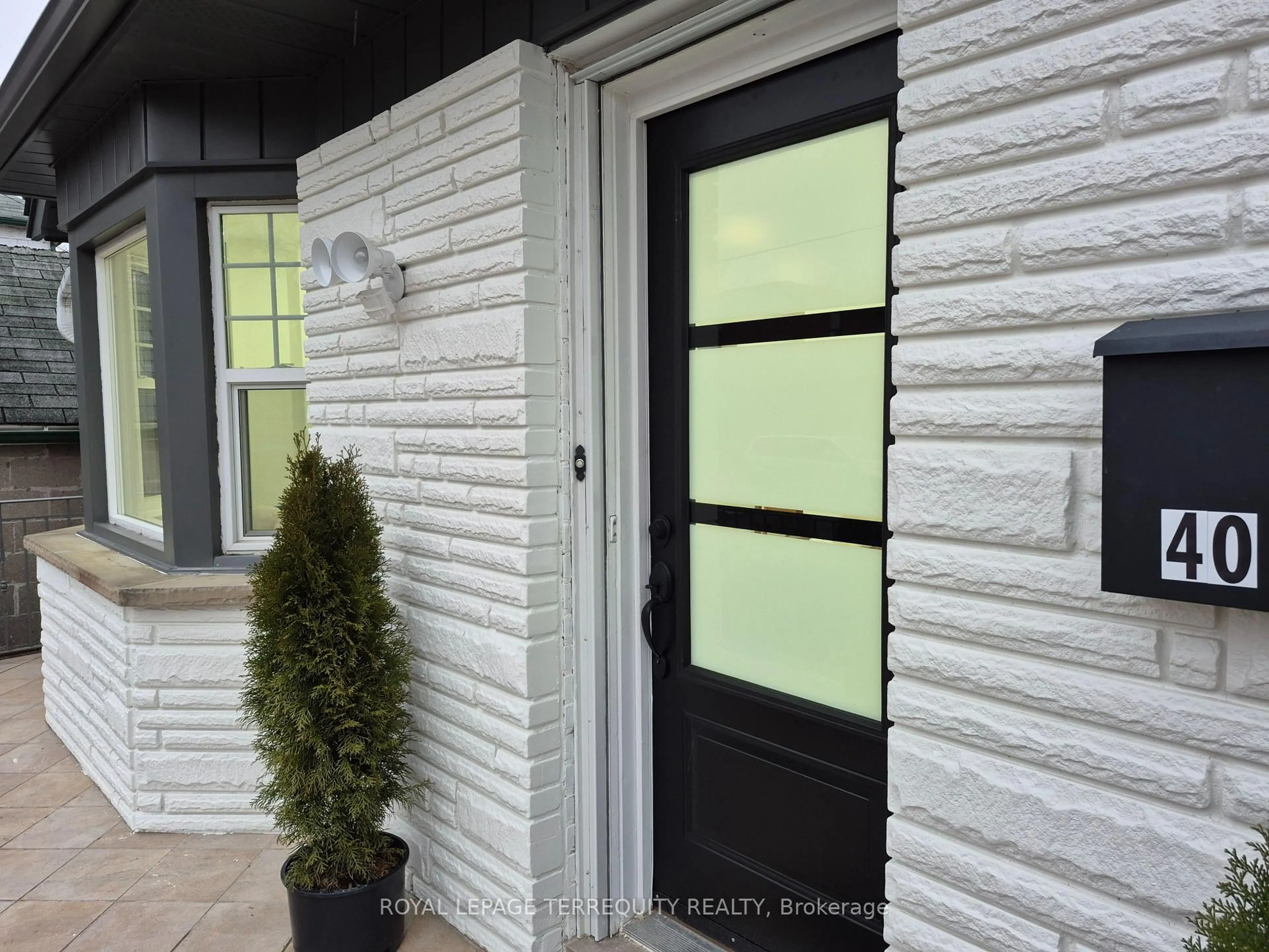 Home with vinyl exterior material, street for 40 Leroy Ave, Toronto Ontario M4J 4G8