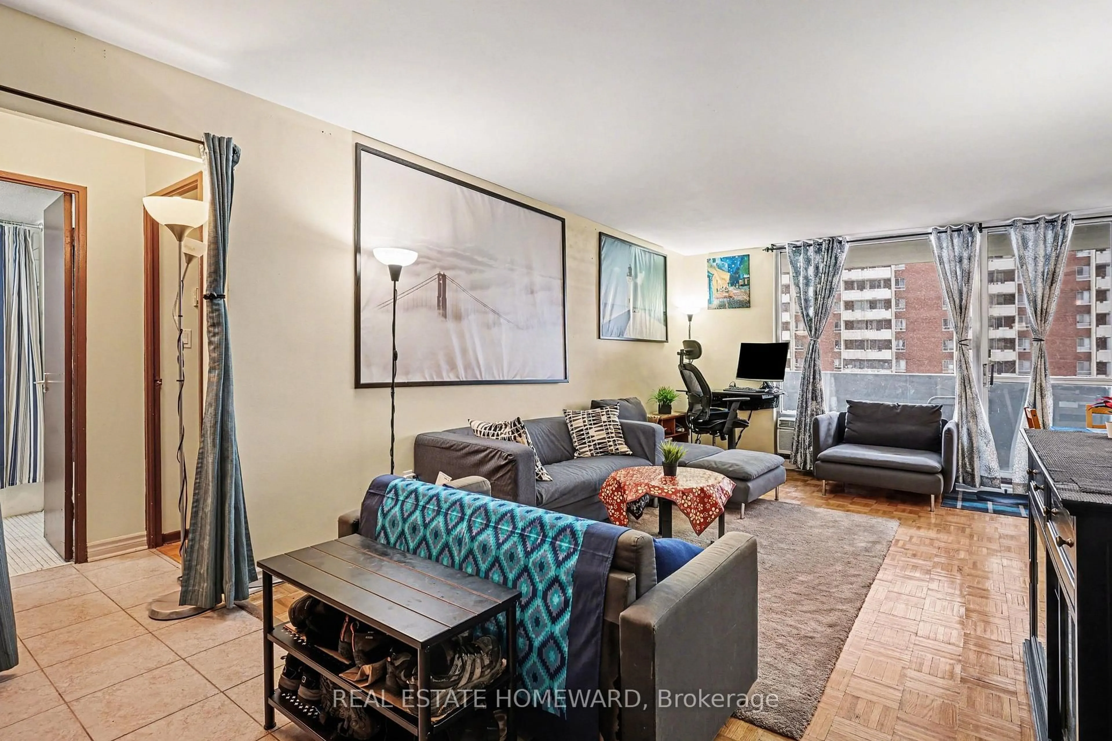 Living room with furniture, unknown for 5 Massey Sq #1503, Toronto Ontario M4C 5L6