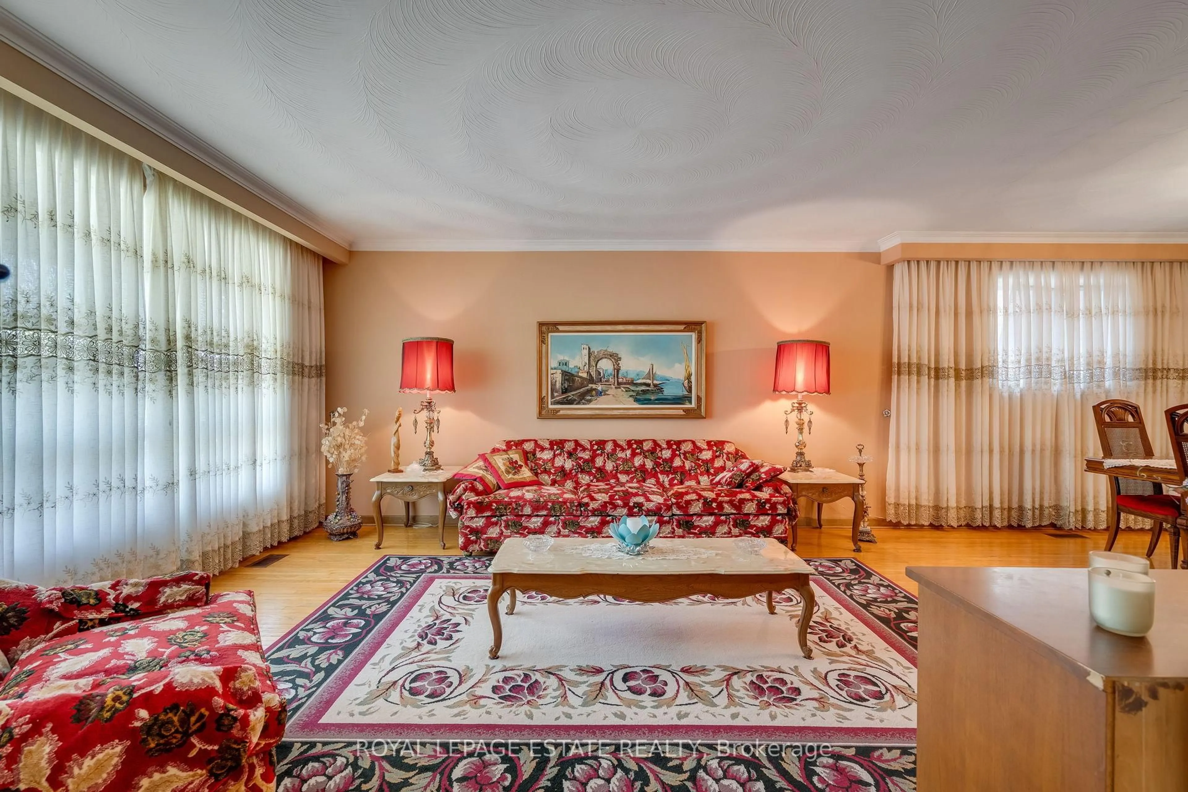 Living room with furniture, carpet floor for 17 Altair Ave, Toronto Ontario M1W 2R1