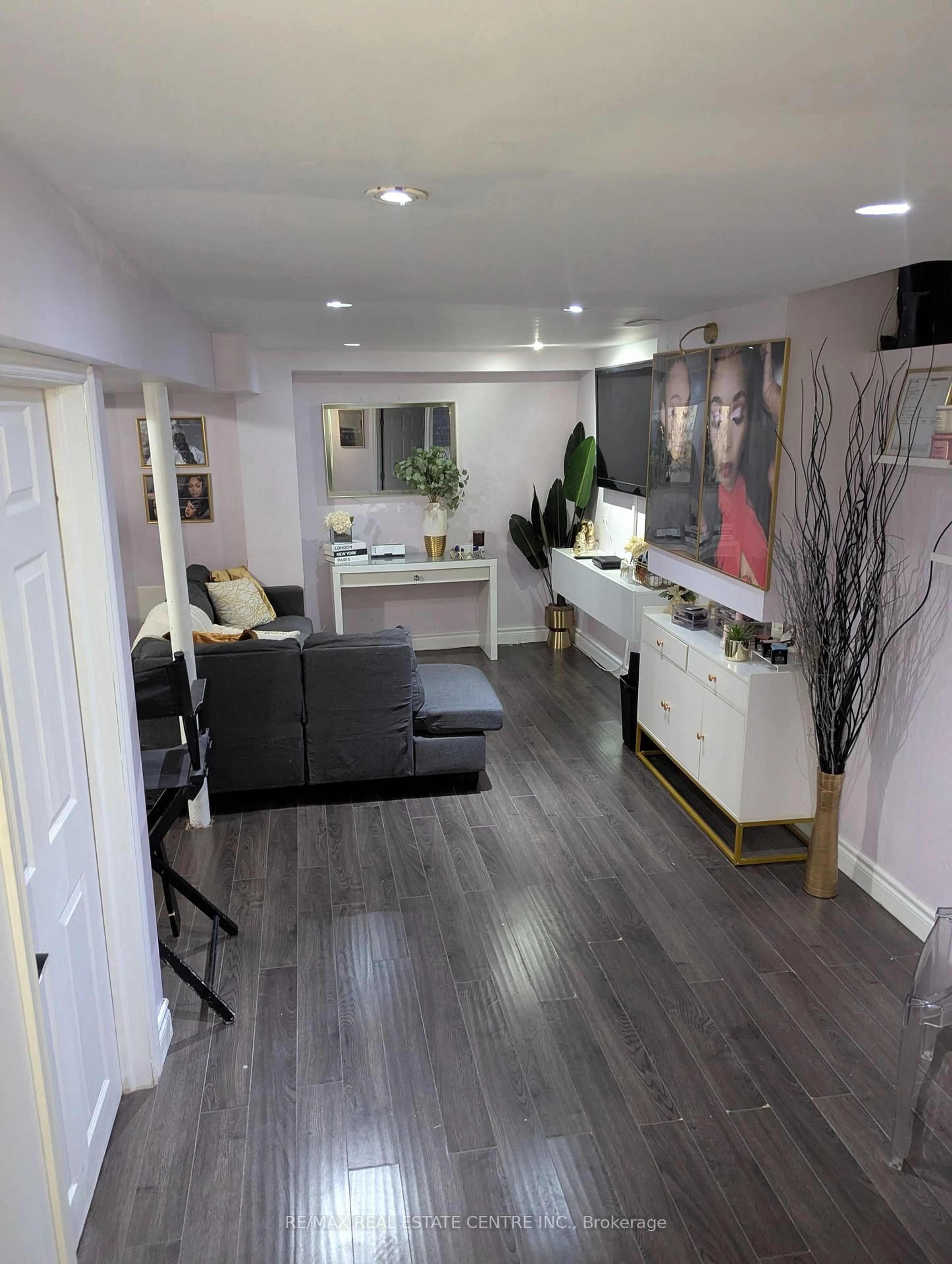 Living room with furniture, wood/laminate floor for 130 Wright Cres, Ajax Ontario L1S 6X7