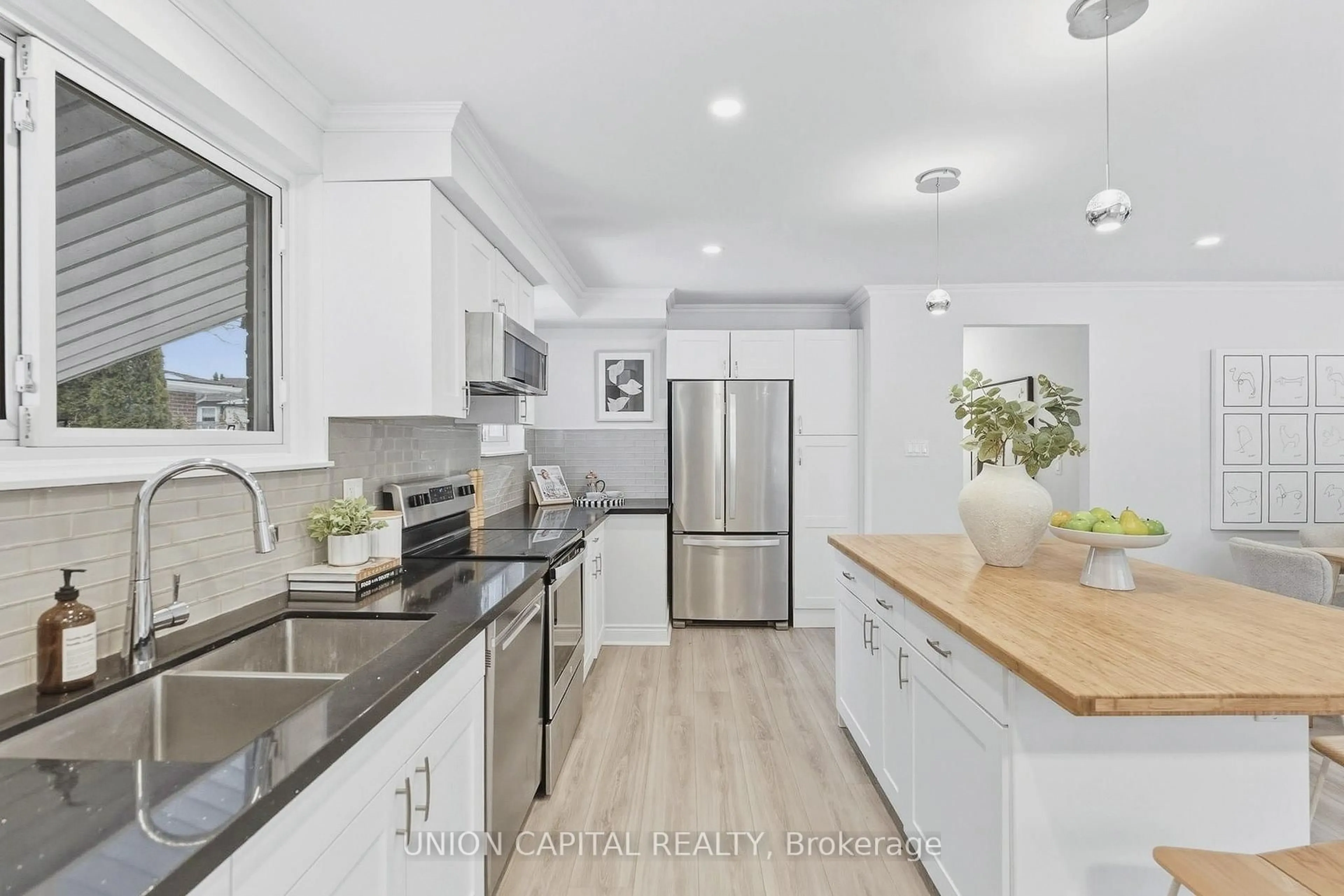 Open concept kitchen, unknown for 144 Clements Rd, Ajax Ontario L1S 1L7