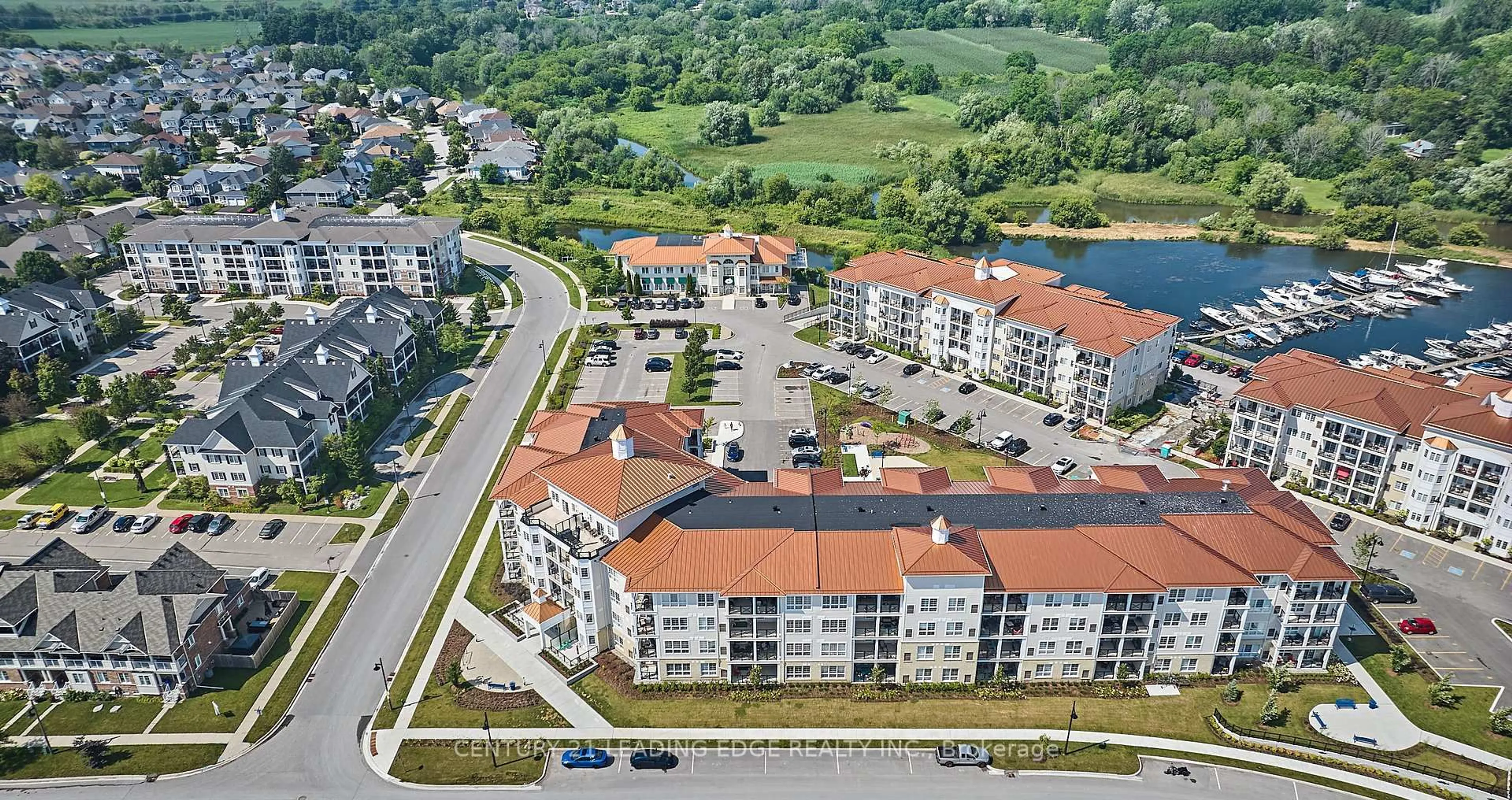 A pic from outside/outdoor area/front of a property/back of a property/a pic from drone, unknown for 50 Lakebreeze Dr #105, Clarington Ontario L1B 0V9