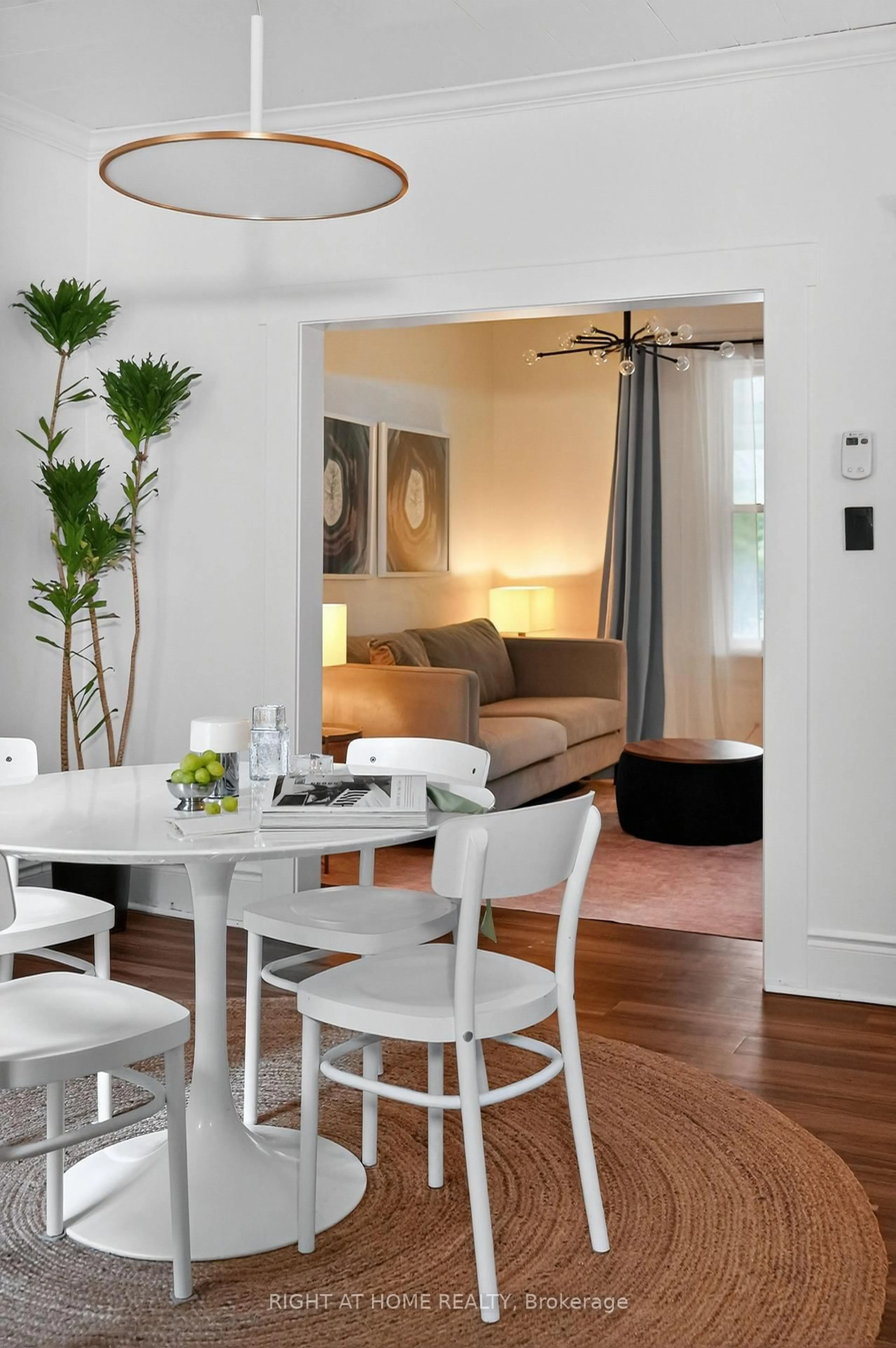 Dining room, wood/laminate floor for 796 Kingston Rd, Toronto Ontario M4E 1R7