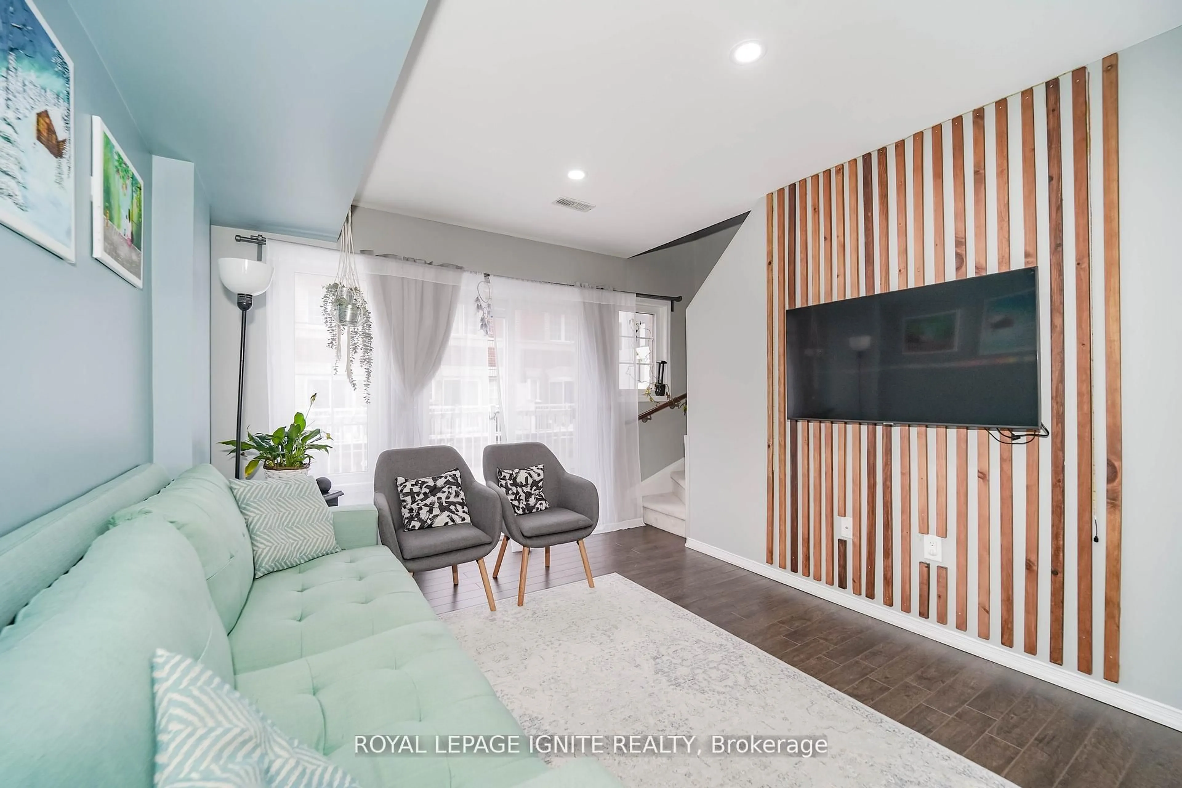 Living room with furniture, wood/laminate floor for 9 Cooperage Lane, Ajax Ontario L1S 0E8