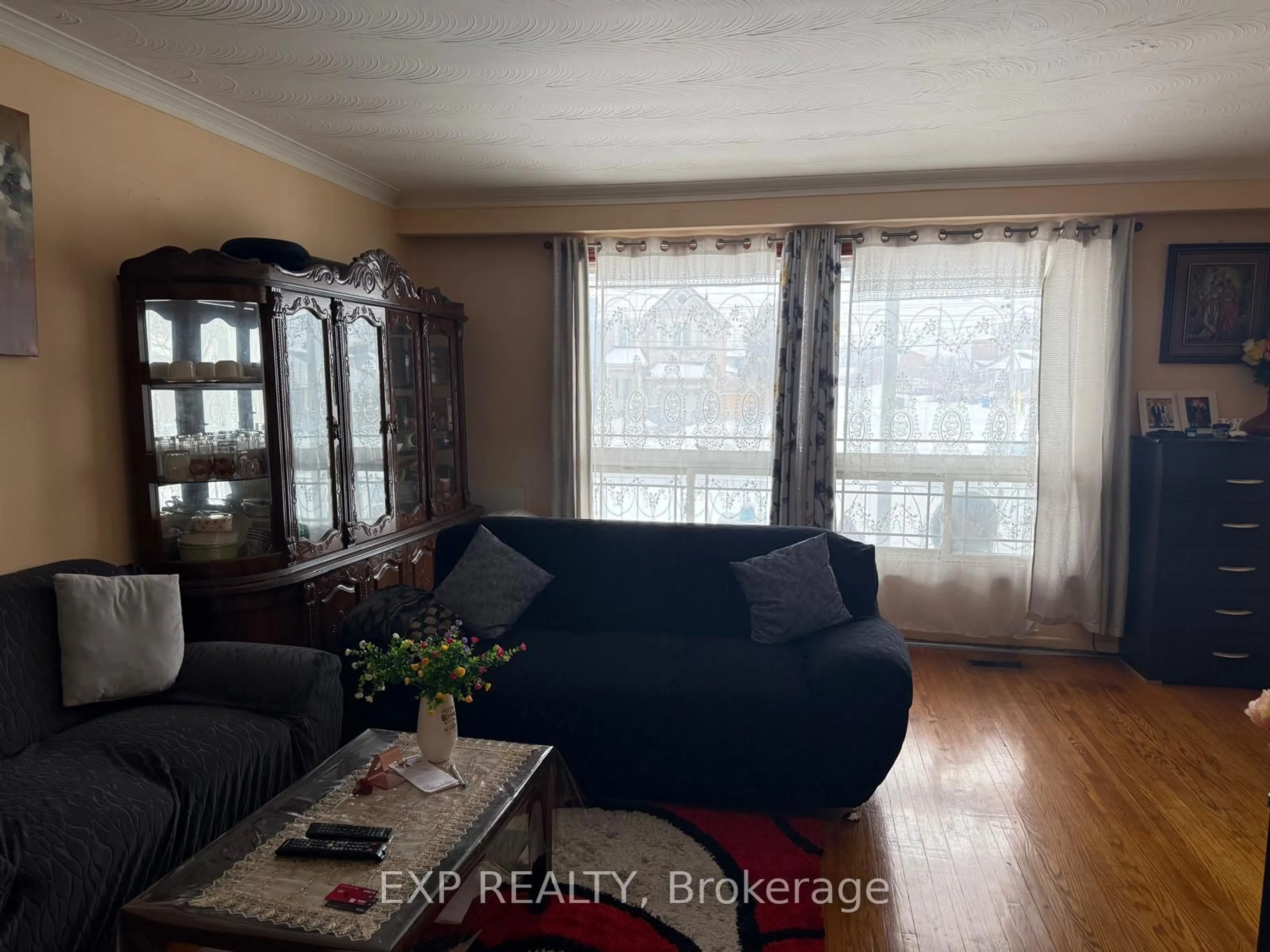 Living room with furniture, wood/laminate floor for 518 Birchmount Rd, Toronto Ontario M1K 1N8