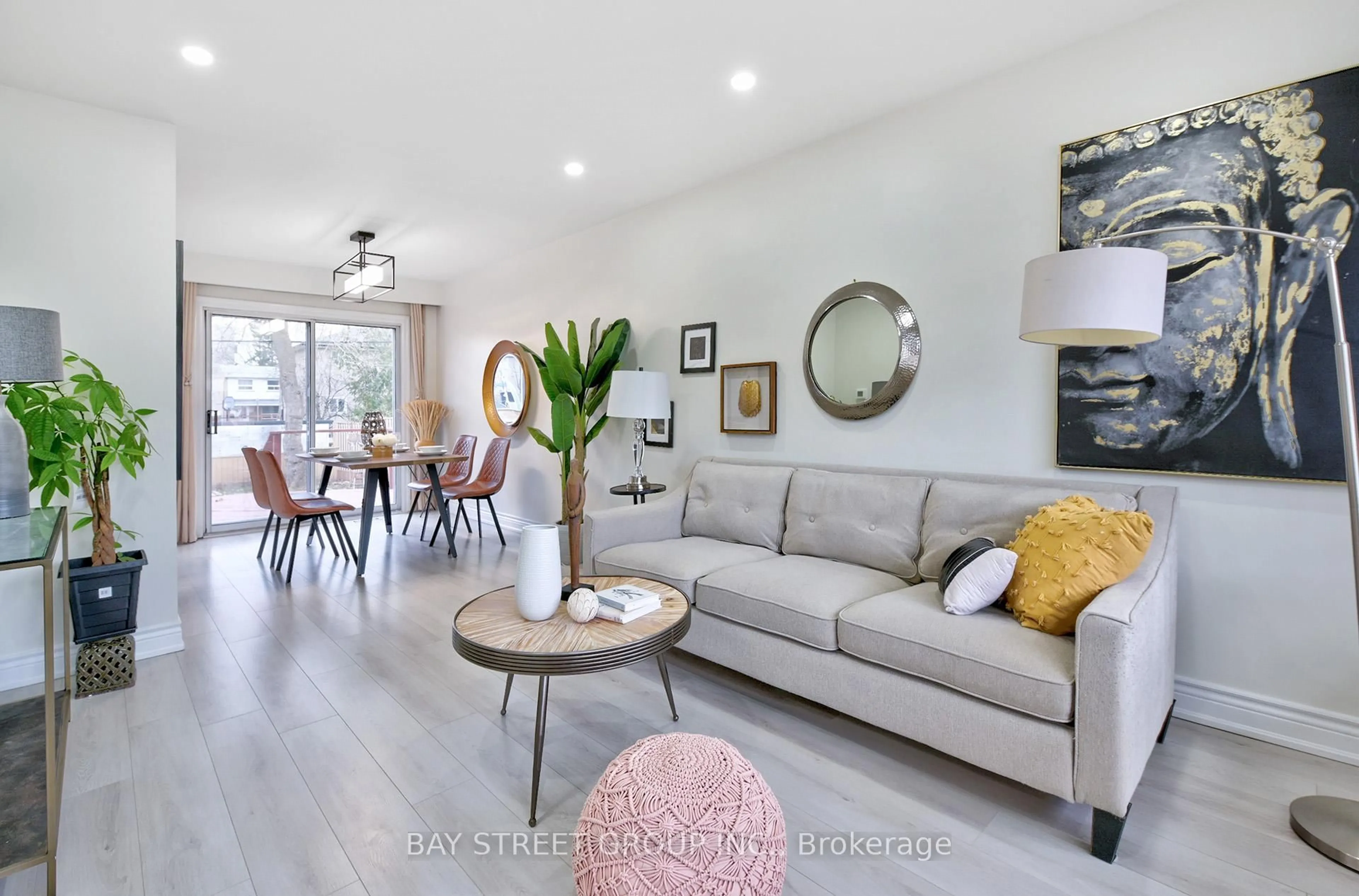 Living room with furniture, wood/laminate floor for 150 Vauxhall Dr, Toronto Ontario M1P 1R4