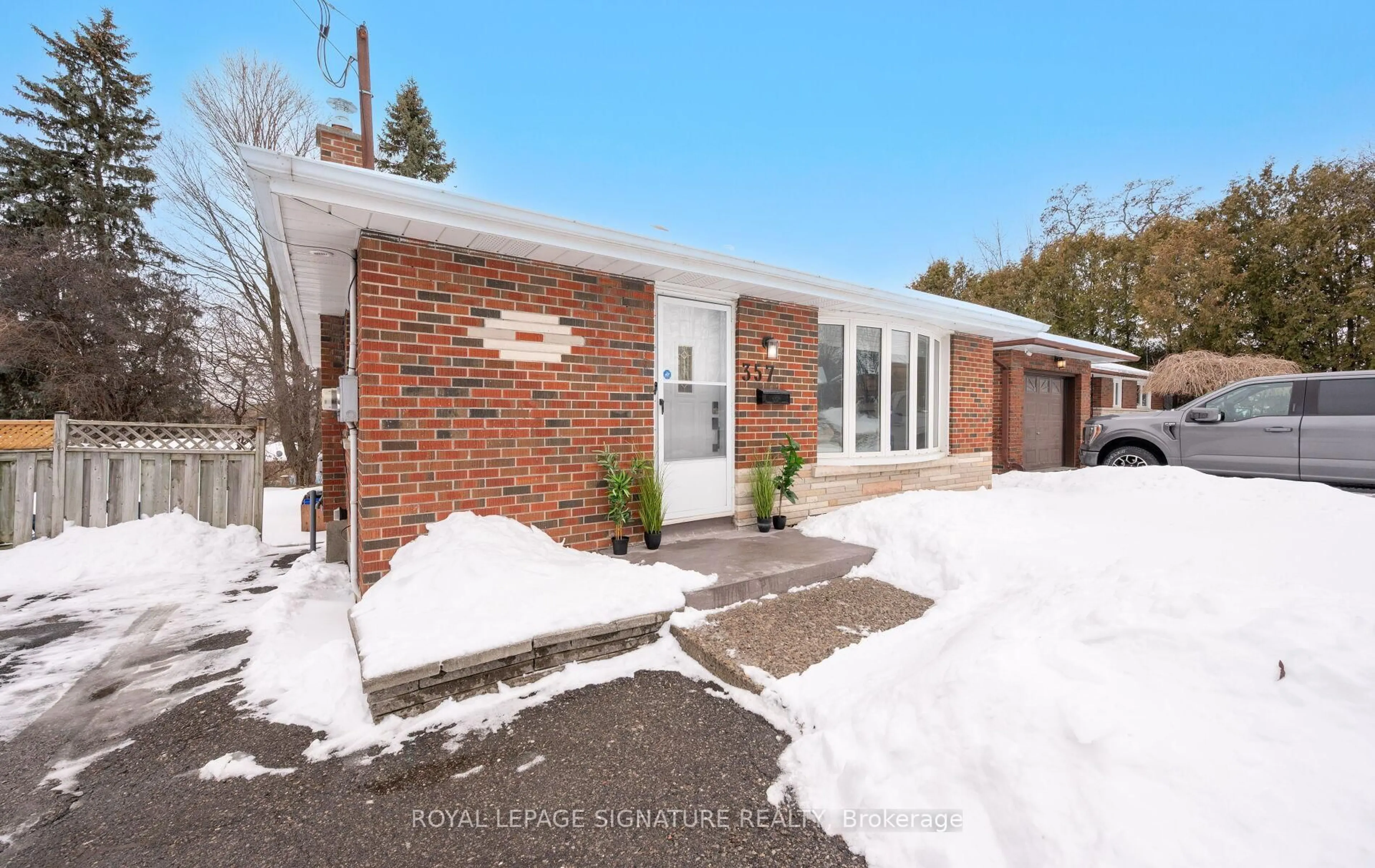Home with brick exterior material, street for 357 Rossland Rd, Oshawa Ontario L1G 2X2