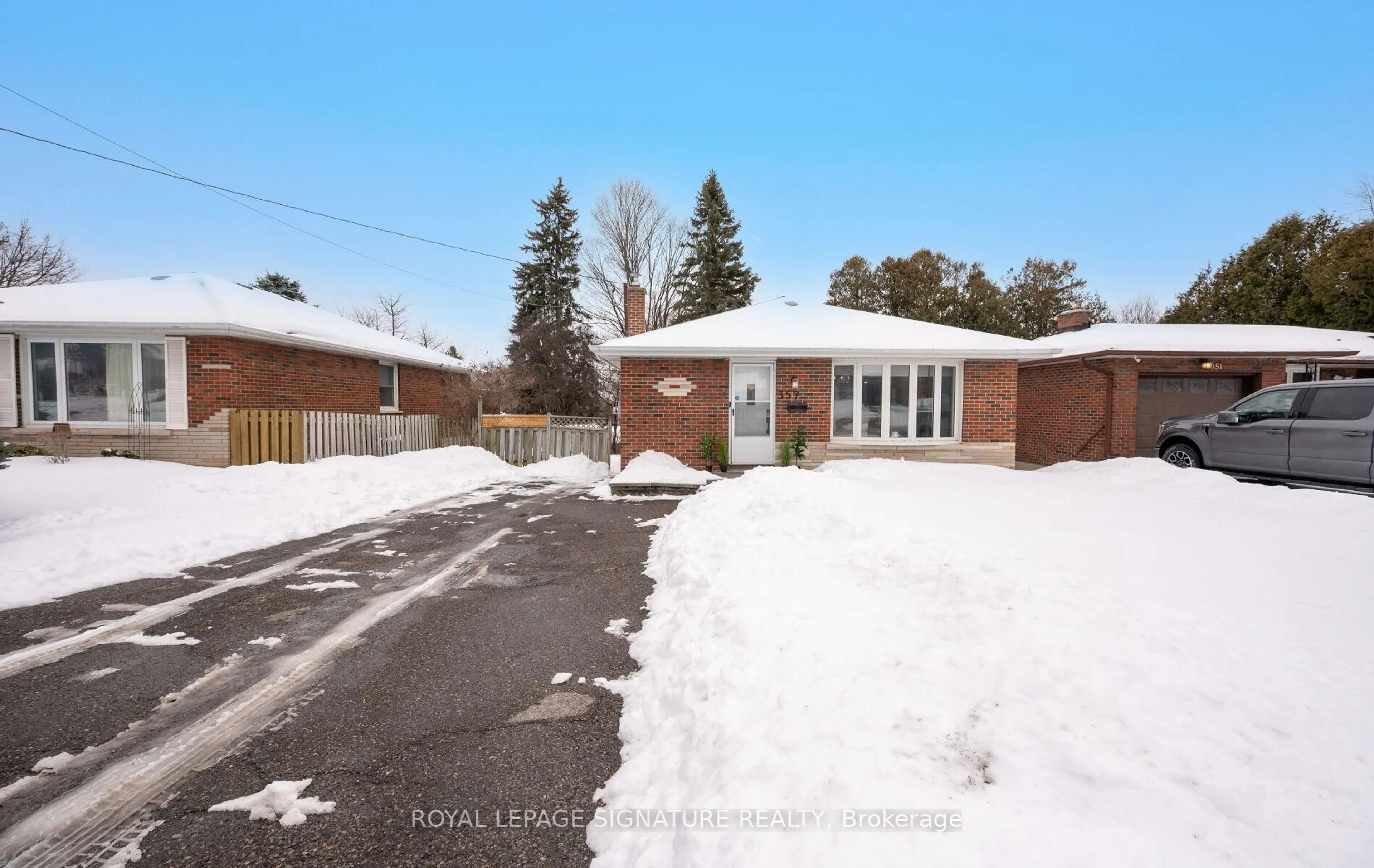 Home with brick exterior material, street for 357 Rossland Rd, Oshawa Ontario L1G 2X2