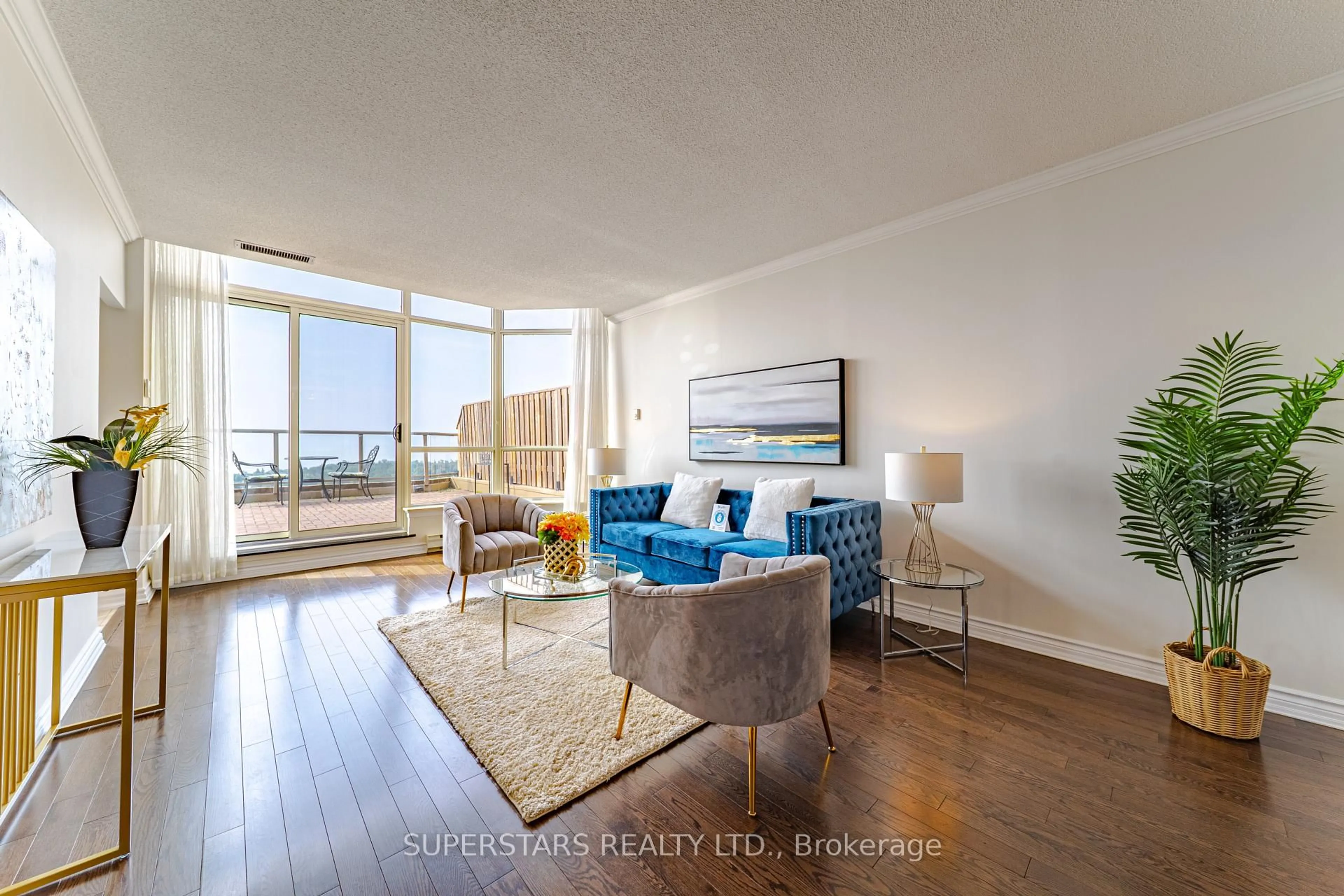 Living room with furniture, wood/laminate floor for 20 Guildwood Pkwy #PH14, Toronto Ontario M1E 5B6